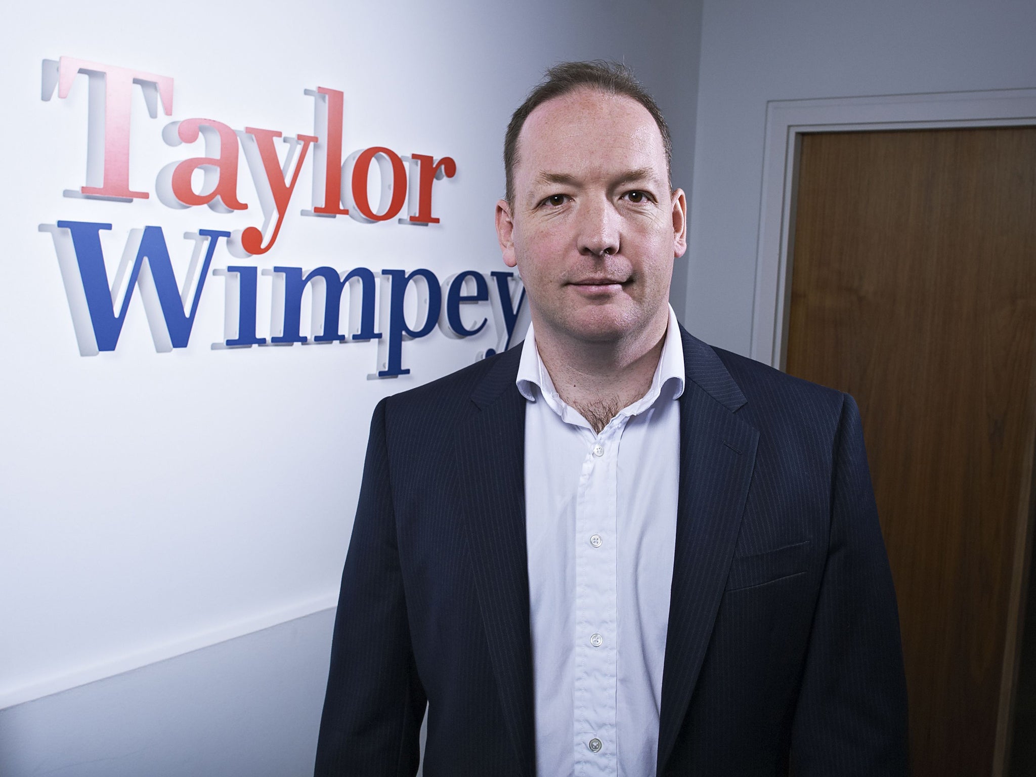 The chief executive of Taylor Wimpey, Pete Redfern, believes that interest rates are likely to be on hold for the rest of the year (Rex)