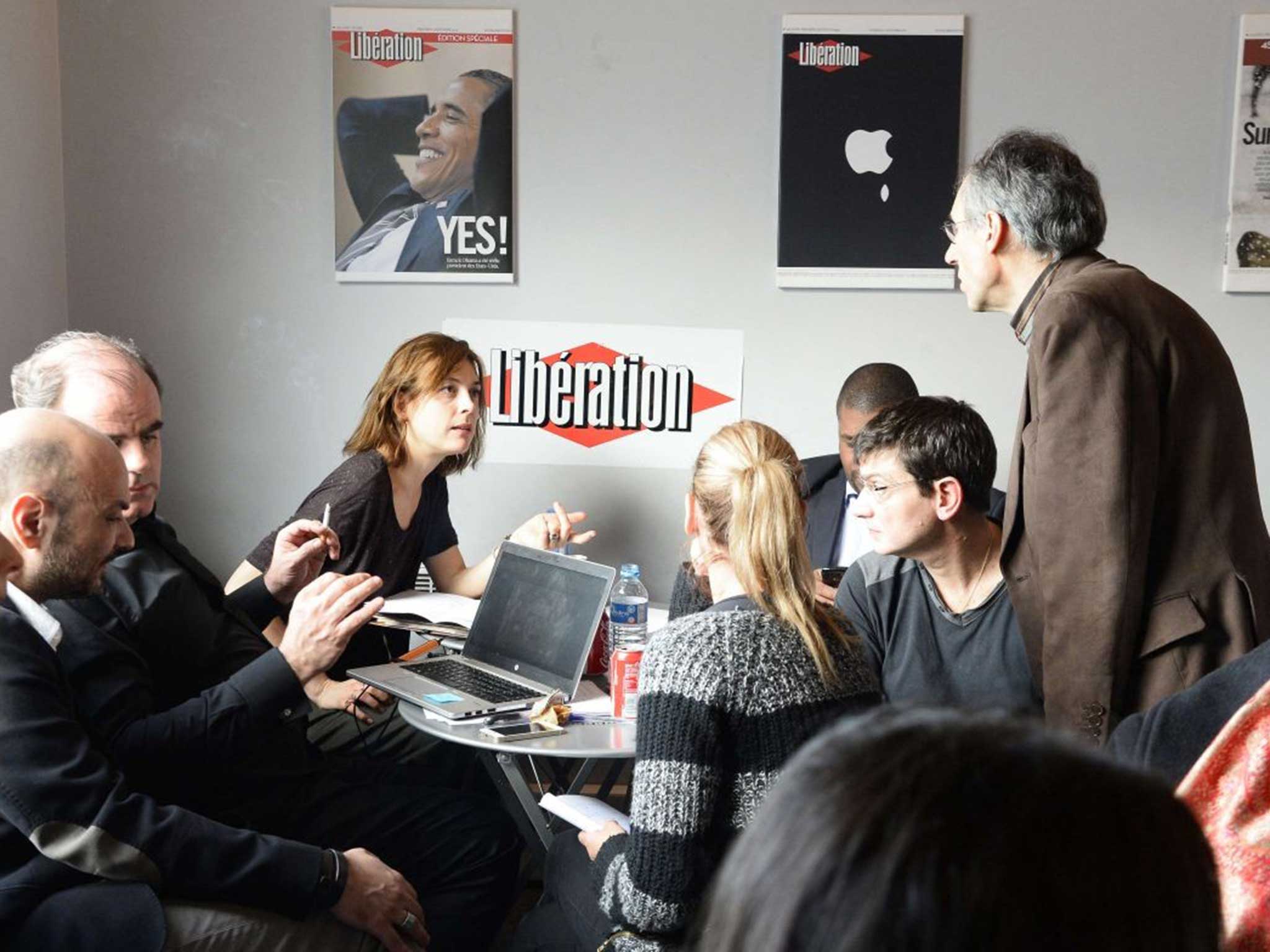 Remaining ‘Charlie Hebdo’ staff at work, in the ‘Libération’ offices, two days after last week’s shootings
