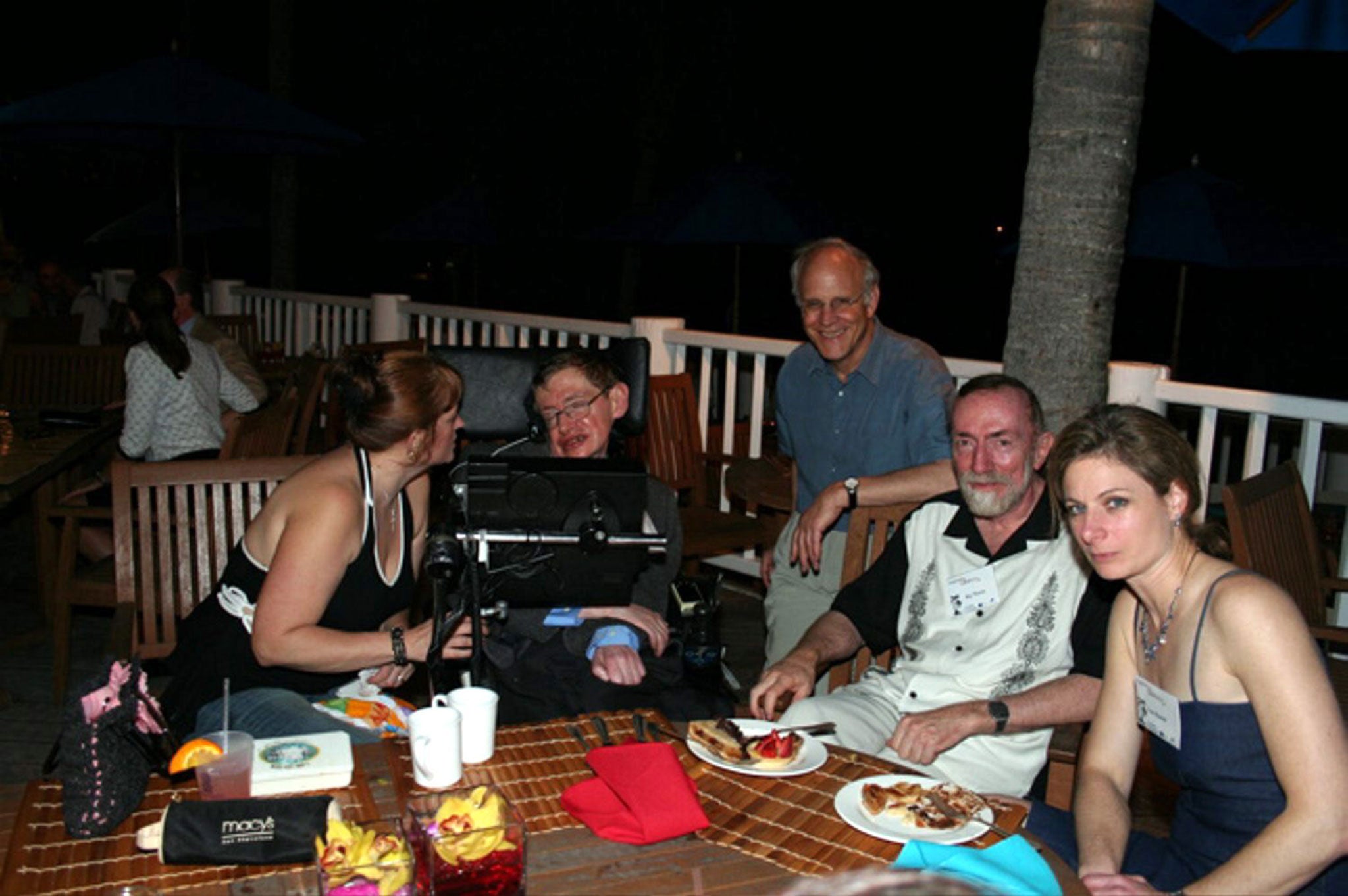 Renowned British theoretical physicist Stephen Hawking enjoys a barbecue on Jeffrey Epstein's Caribbean island Little St James while attending a conference on St Thomas in March 2006