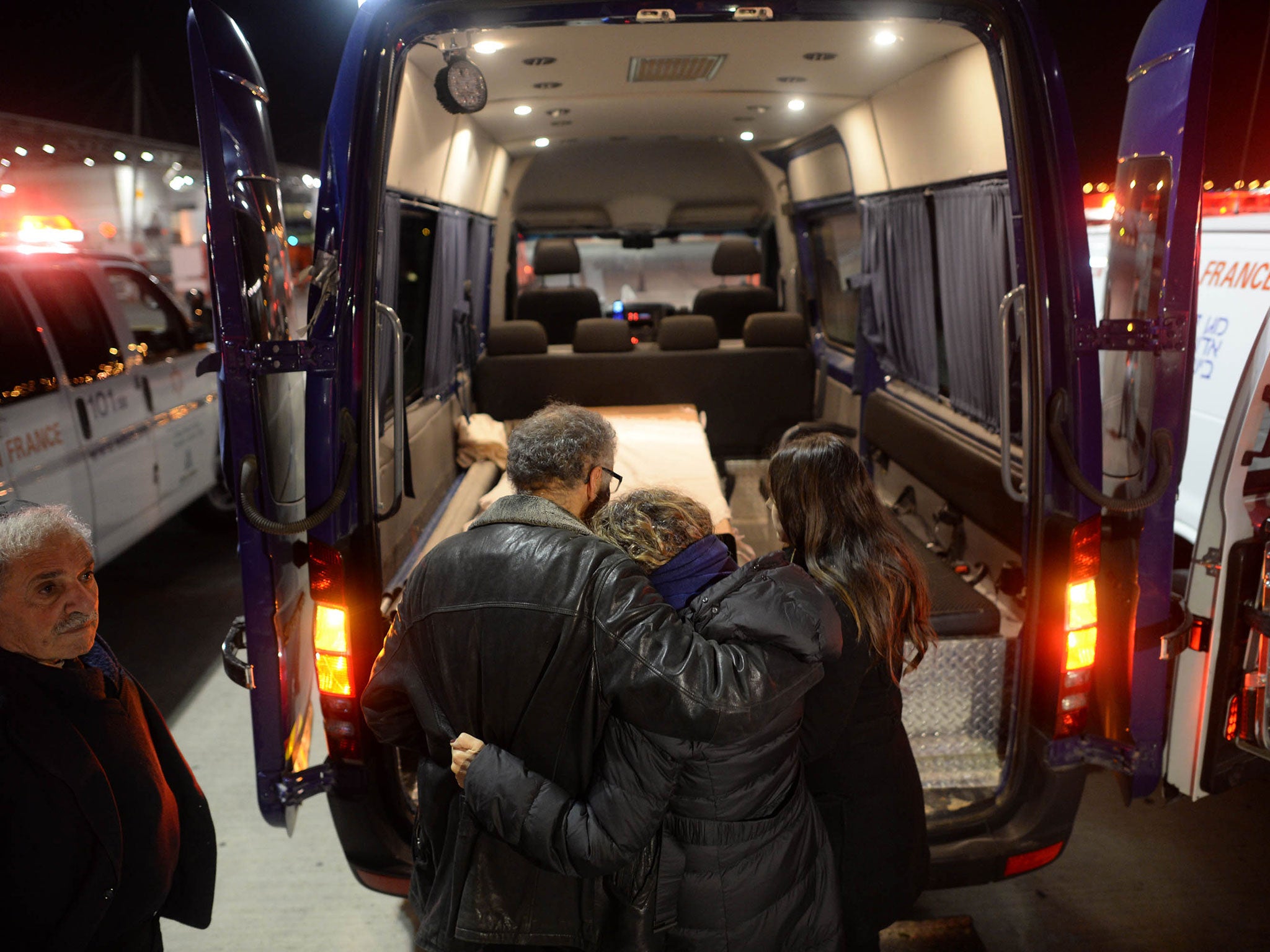 Coffins of the four Jewish terror victims who were killed during a hostage standoff at a kosher supermarket in Paris arrive at Ben Gurion airport in Tel Aviv