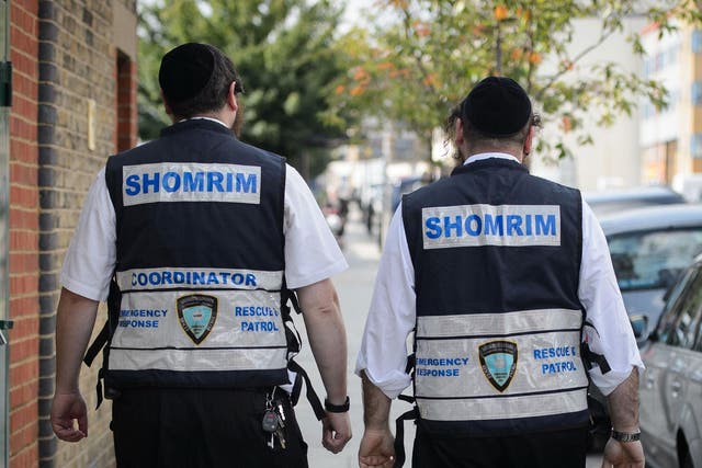 Members of the Jewish 'Shomrim' security patrol team are pictured in north London