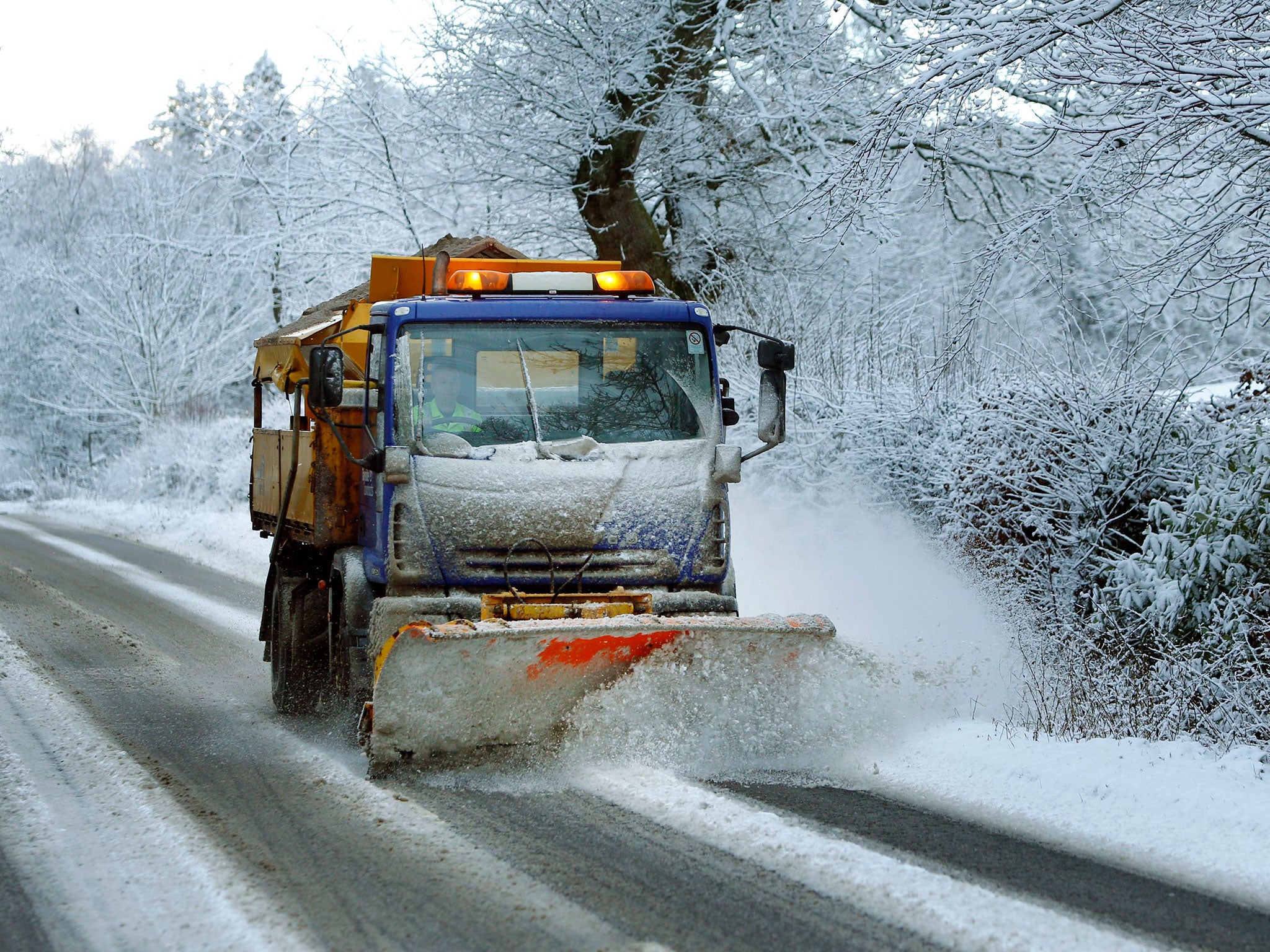 A snow plough on the A93 near Guildtown, as snow brings fresh disruption to parts of the UK