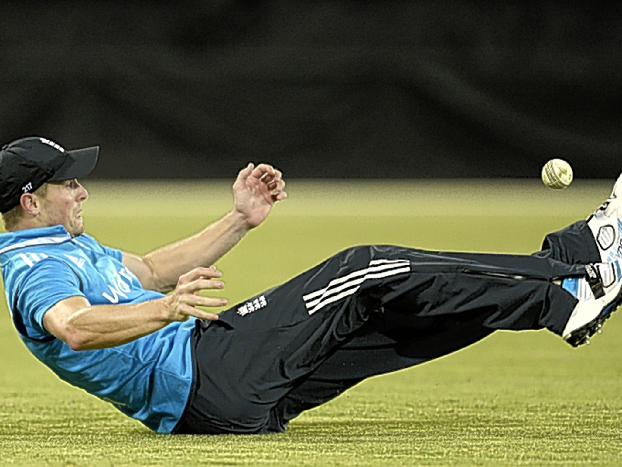 Chris Woakes keeps the ball up with his feet before his incredible catch