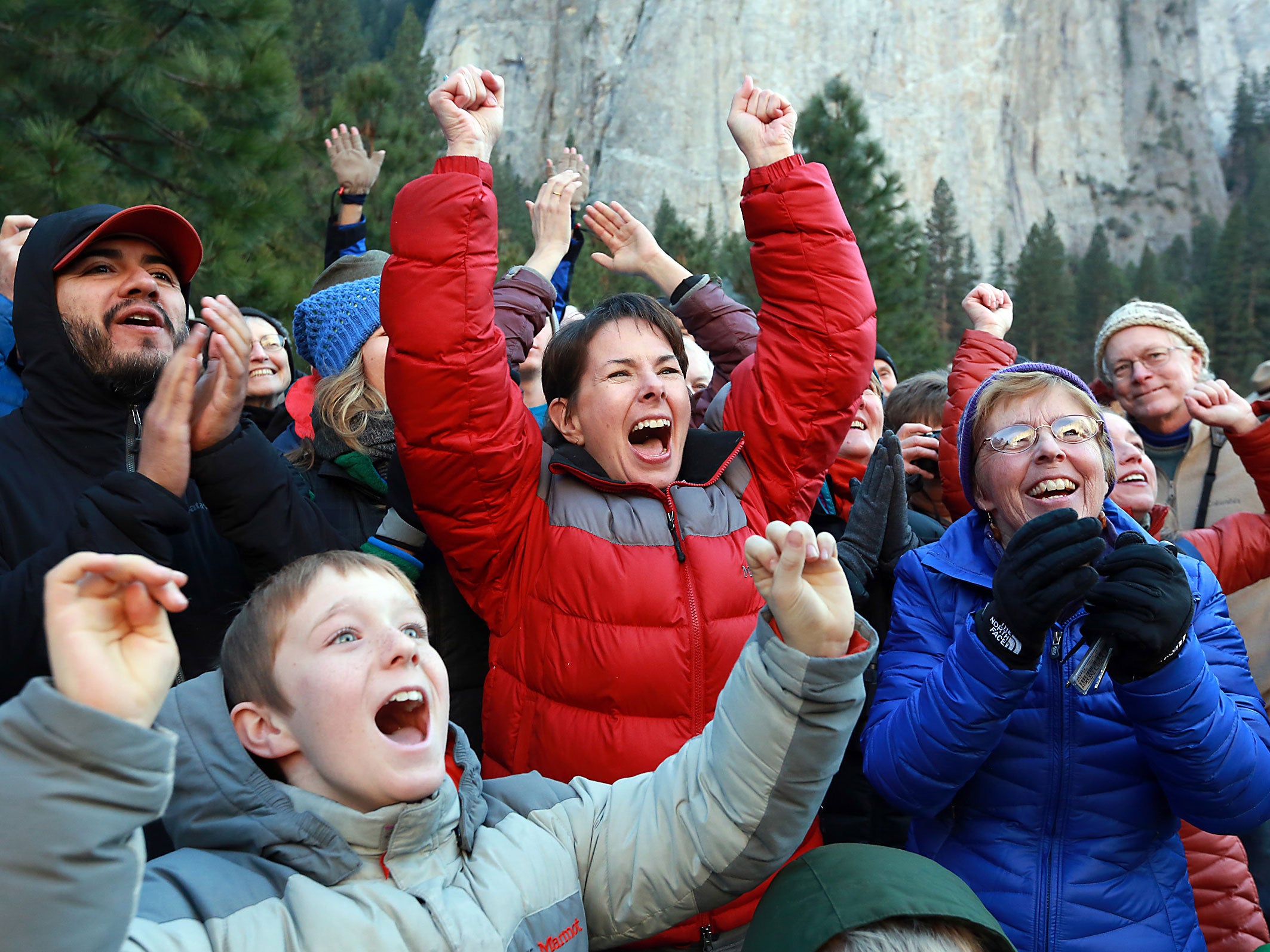 Gaelena Jorgenson raises her arms as her son Kevin completes a free climb of El Capitan