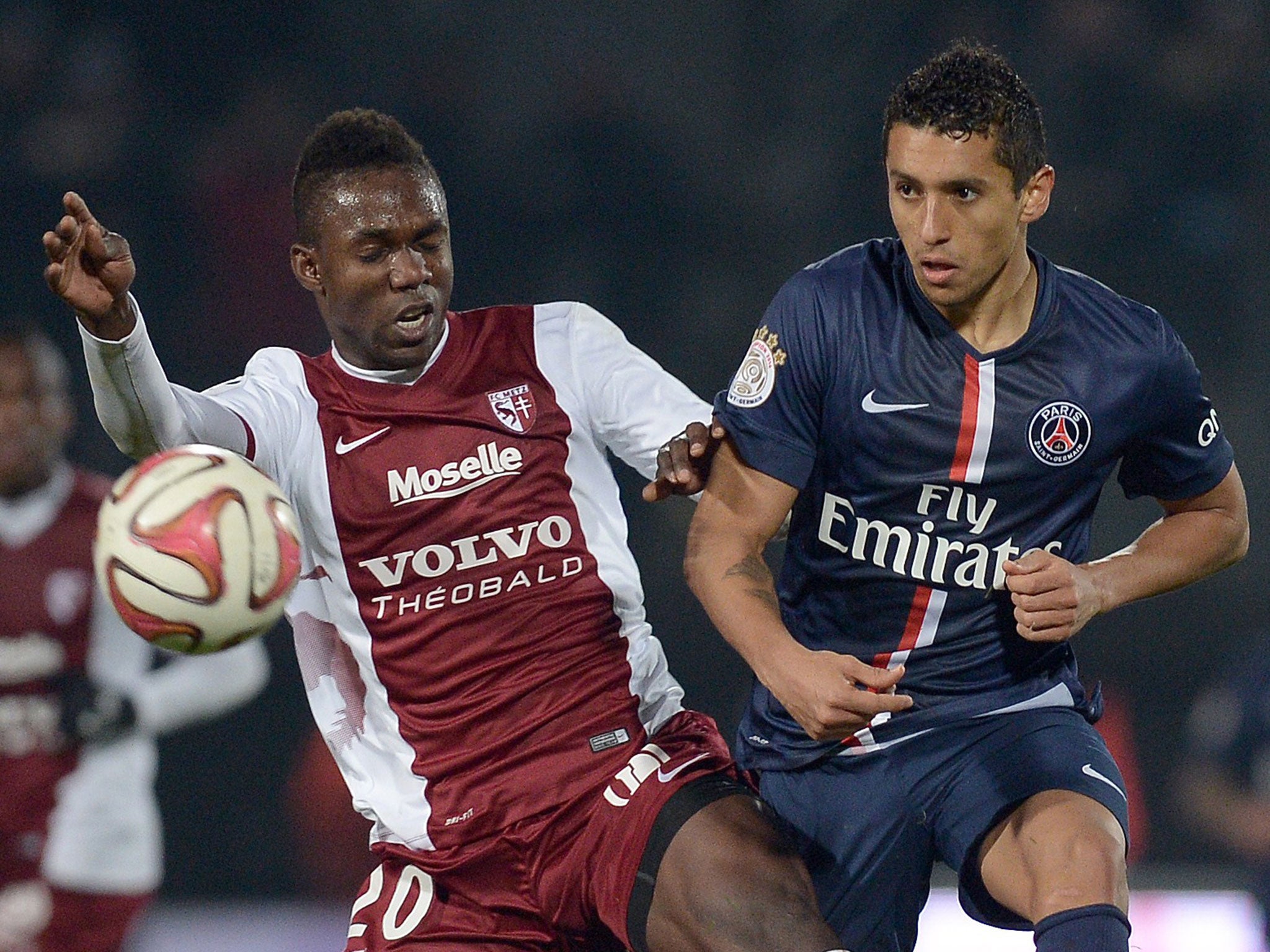 Marquinhos (right) in action for PSG