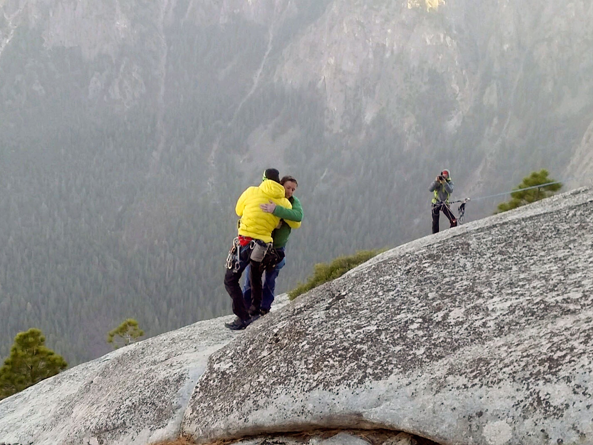 Kevin Jorgeson and partner Tommy Caldwell celebrate after completing the first free climb ascent of El Capitan's Dawn Wall in Yosemite National Park