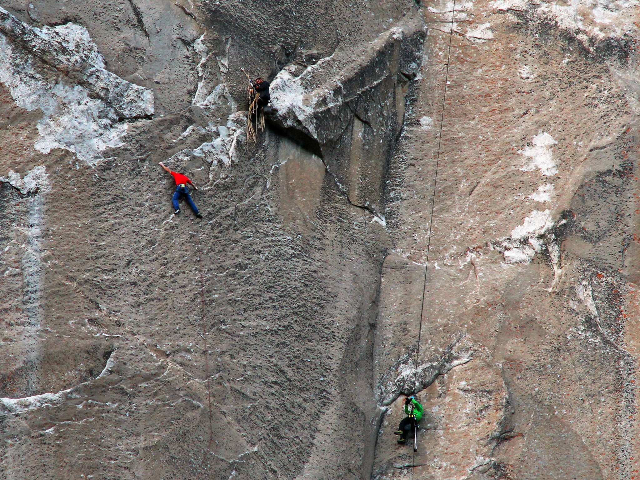 Tommy Caldwell, in red, climbs pitch 19