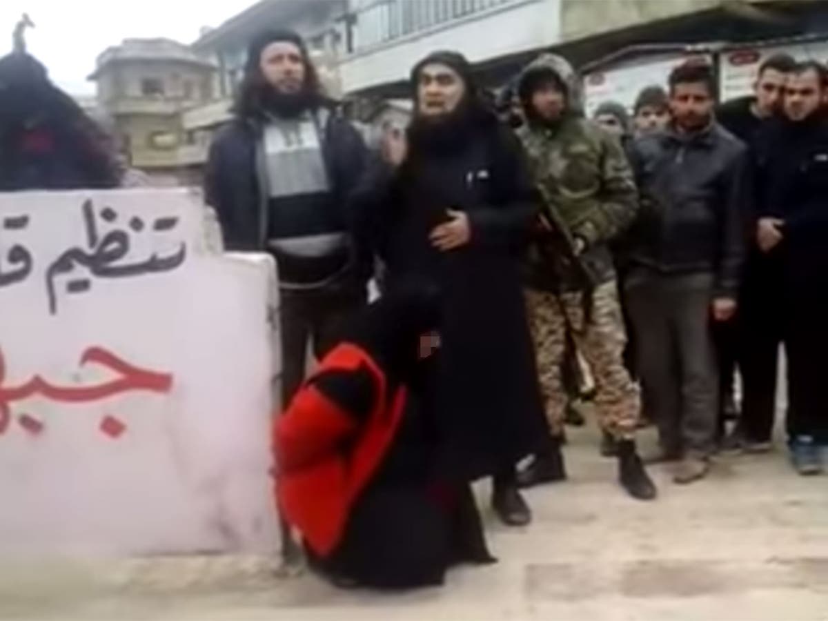 Al-Qaeda video shows public execution of woman accused of adultery | The  Independent | The Independent