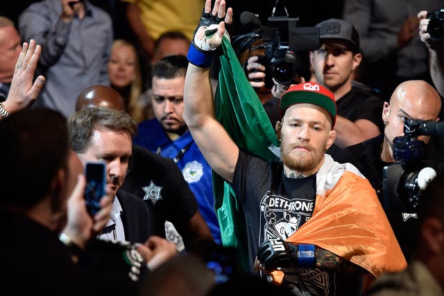Conor McGregor of Ireland enters the arena