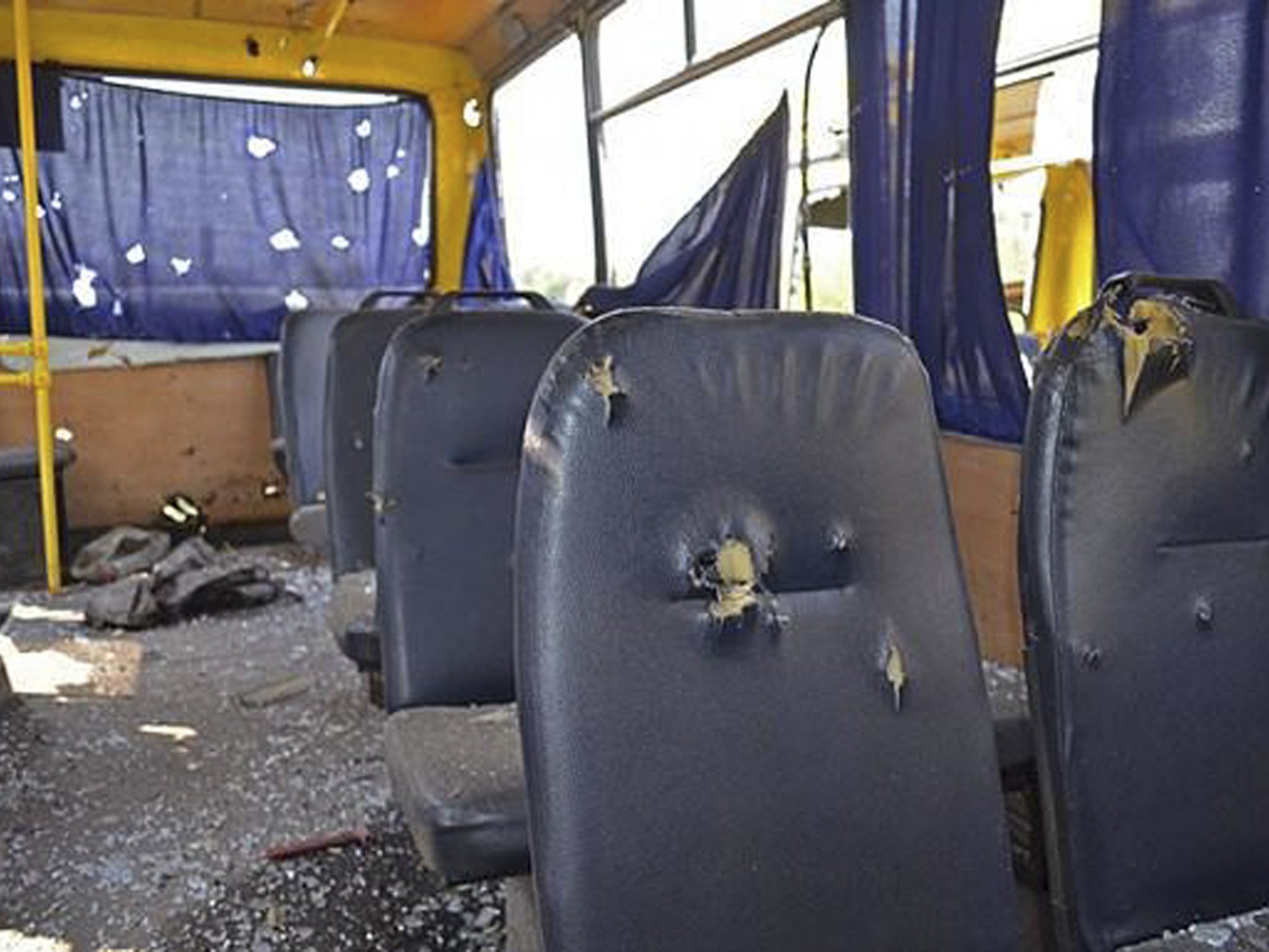 The inside view of a bus destroyed by a rebel shell at the checkpoint near the town of Volnovakha, Donetsk