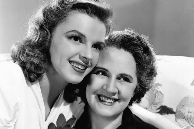 Judy Garland takes time out on the set of musical 'Babes on Broadway' to pose for a portrait with her mother, Ethel Gumm