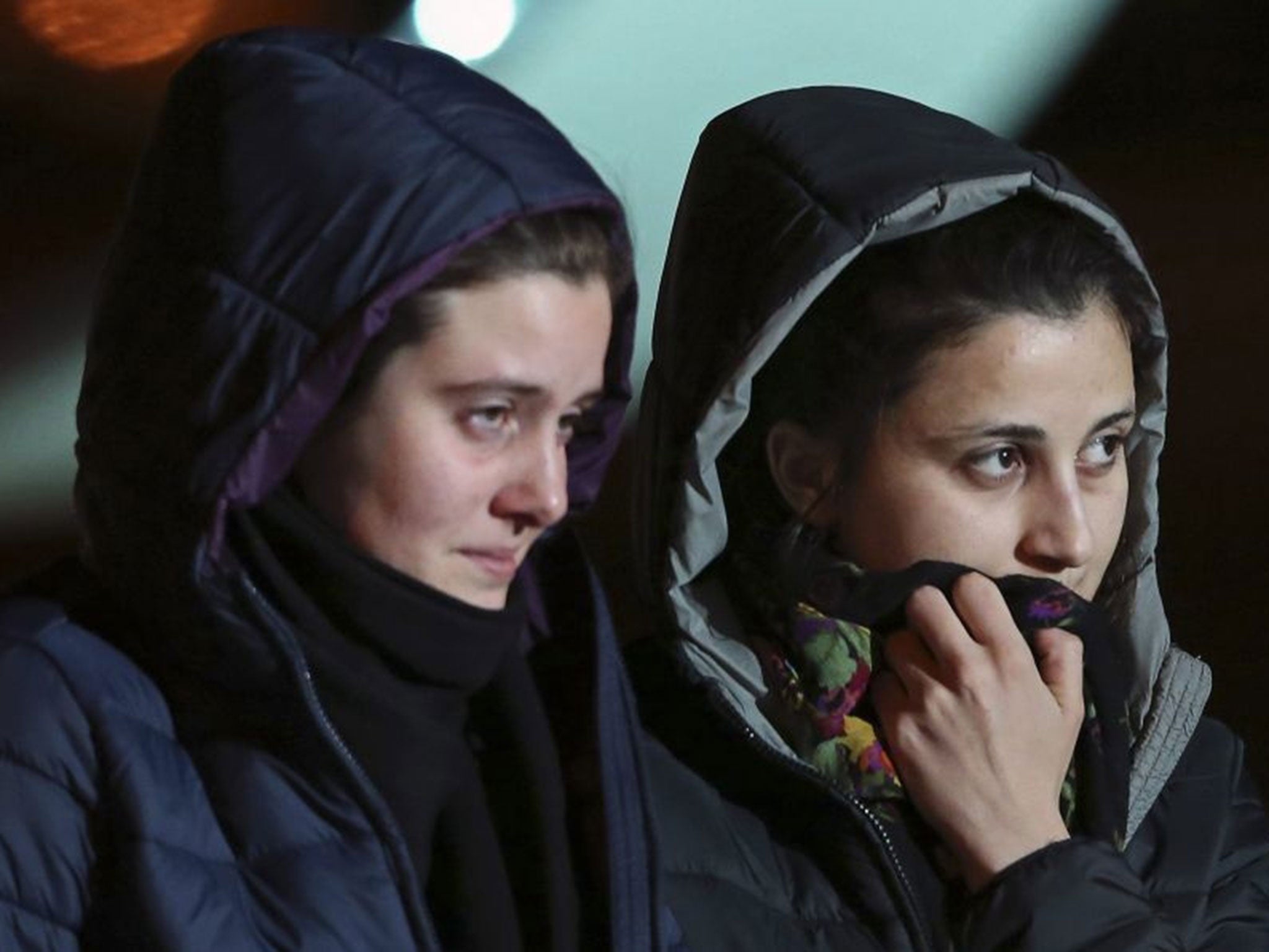 Greta Ramelli (L) and Vanessa Marzullo, two Italian aid workers taken hostage in Syria five months ago, arrive at Ciampino airport in Rome January 16, 2015.