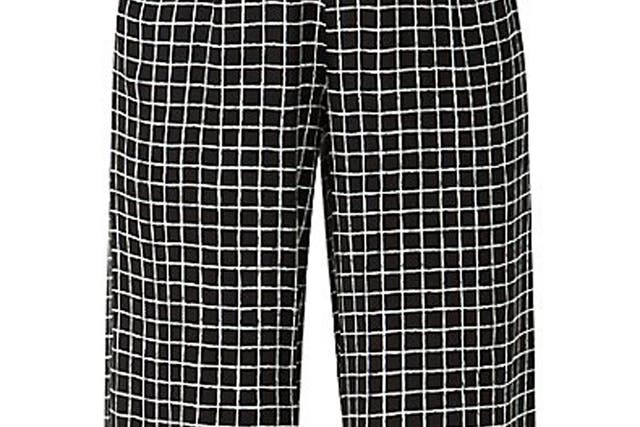 This grid-print pair of trousers is somewhere on the spectrum between a cropped, mannish trouser and a culotte