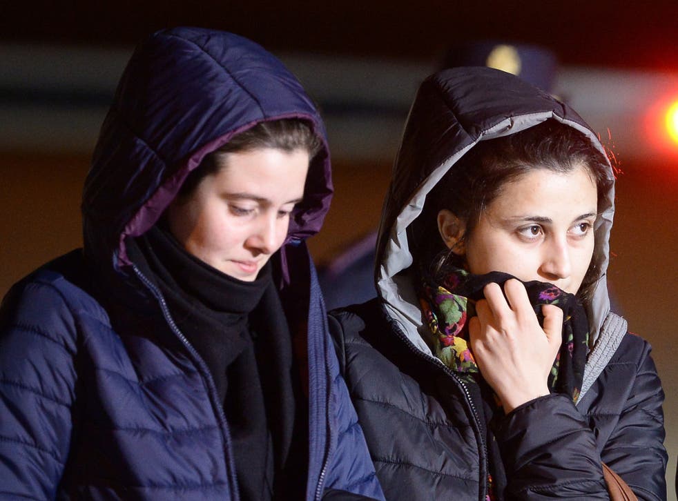 Aid workers Greta Ramelli (left) and Vanessa Marzullo arrived at Ciampino airport in Rome early yesterday after being held captive in Syria since July 2014