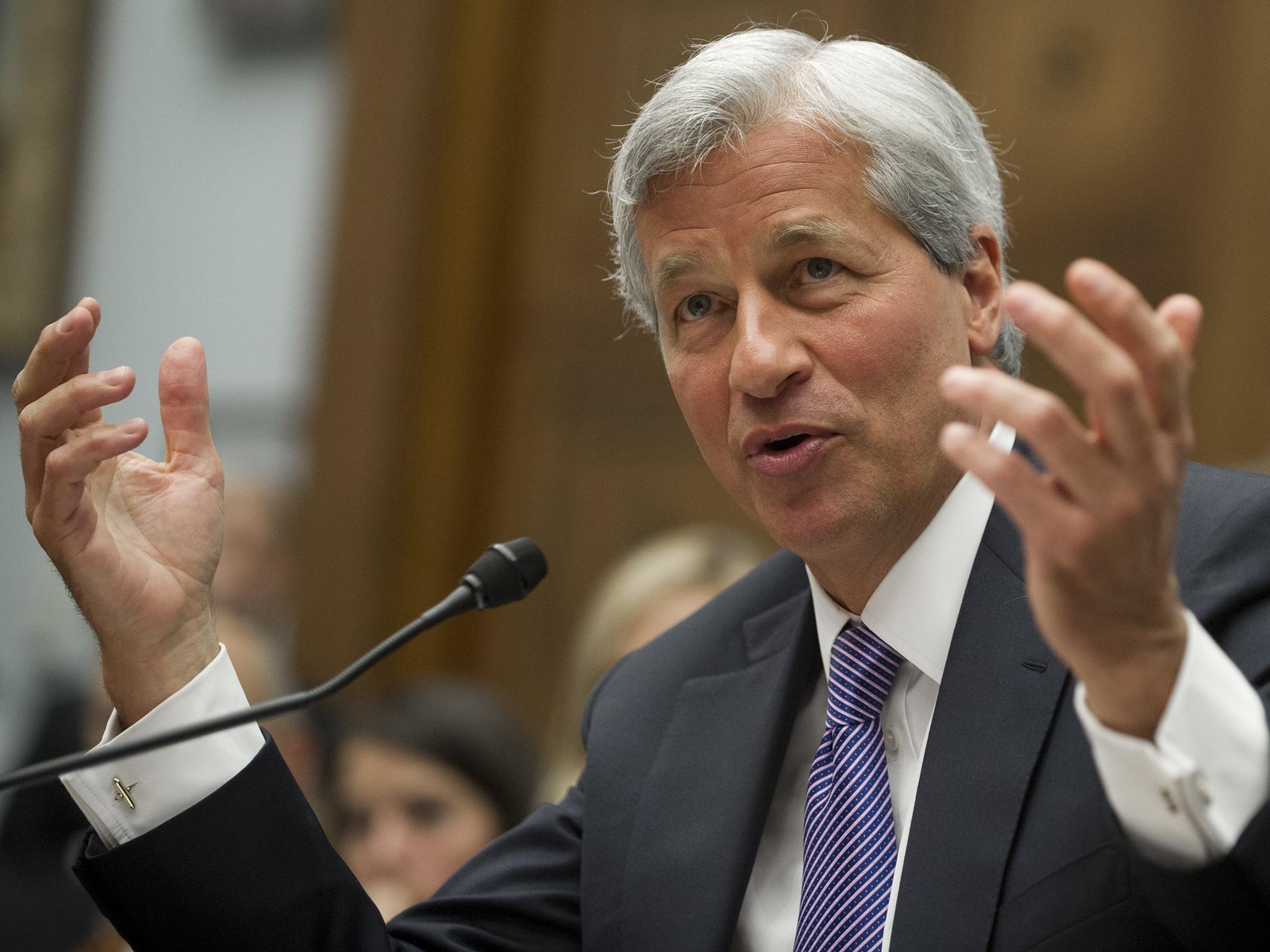 JP Morgan boss Jamie Dimon has revised down an initial estimated of jobs immediately leaving London but they could still go over the long term