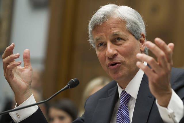 JP Morgan boss Jamie Dimon has revised down an initial estimated of jobs immediately leaving London but they could still go over the long term