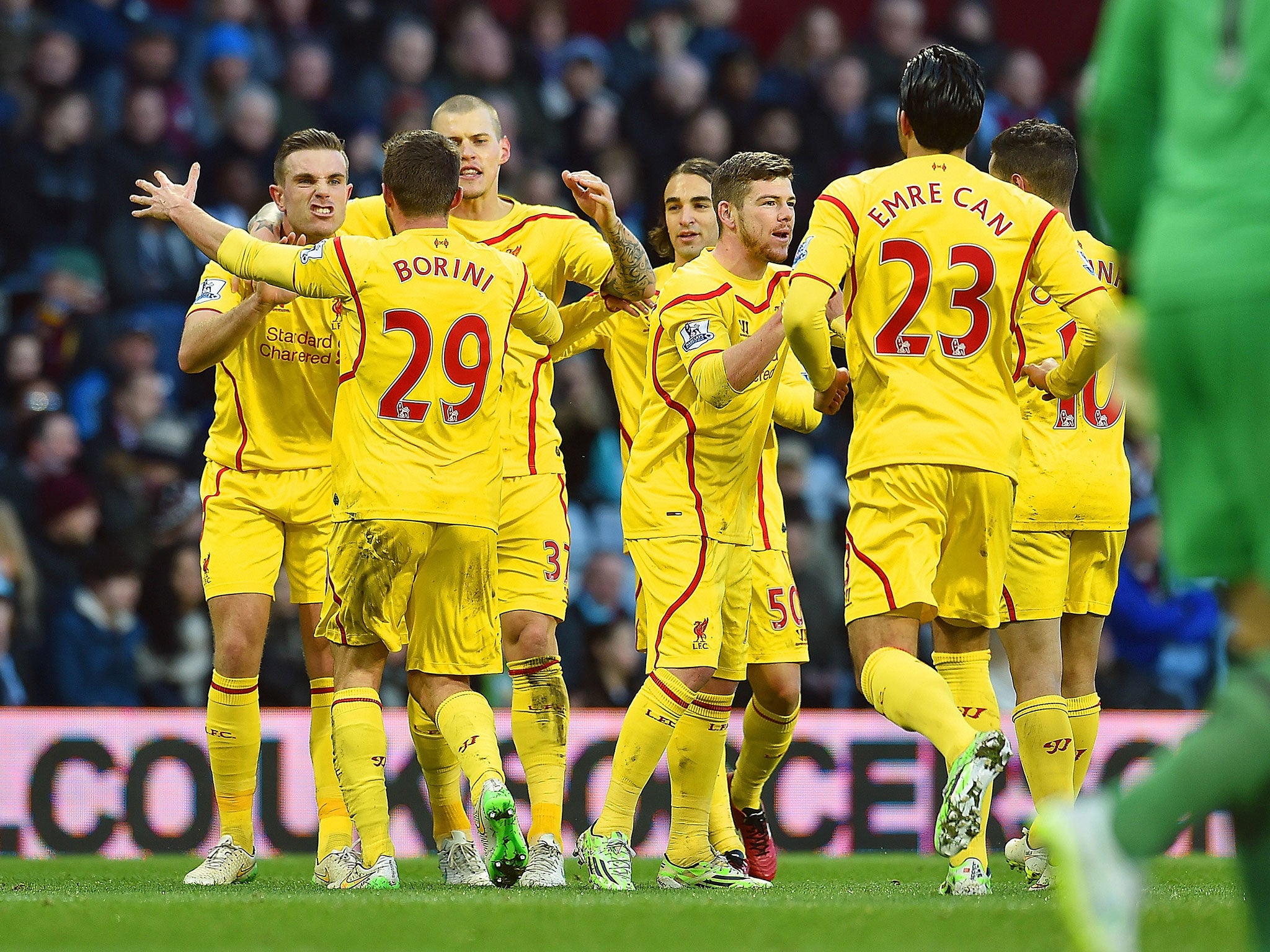 Liverpool celebrates after Fabio Borini puts them ahead early on