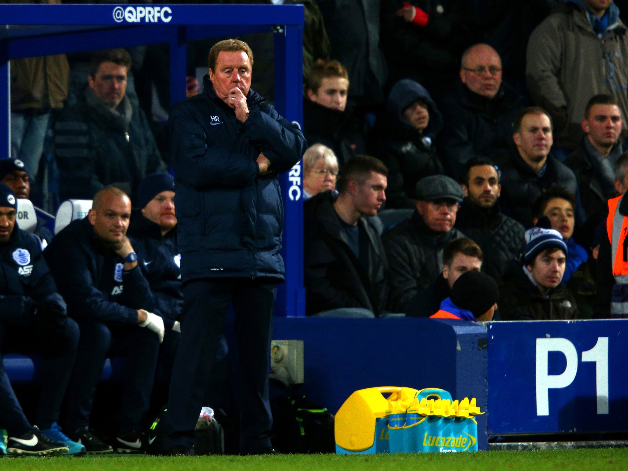 Harry Redknapp looks on from the touchline