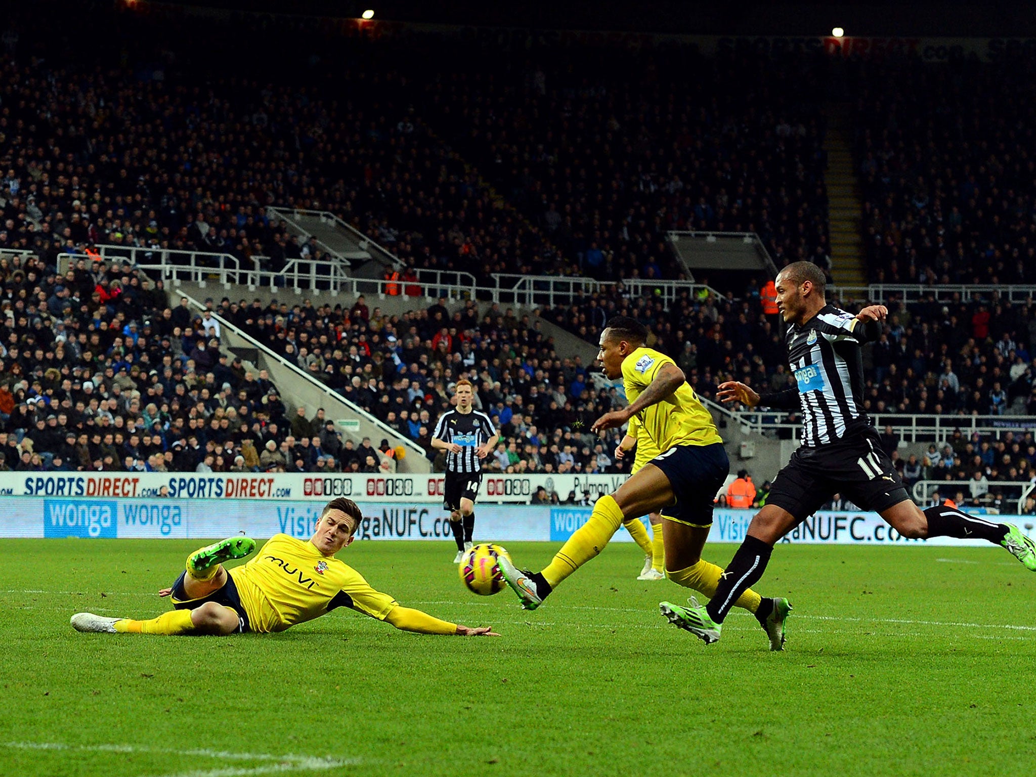 Florin Gardos clears the ball into Yoan Gouffran that deflects into the net