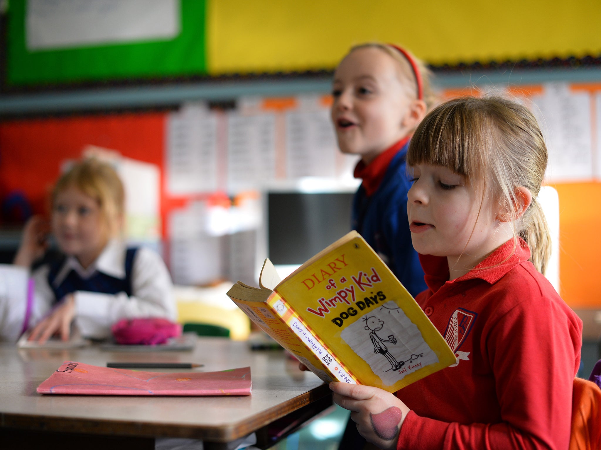 A fifth of children currently leave primary school unable to read or write properly (Getty)