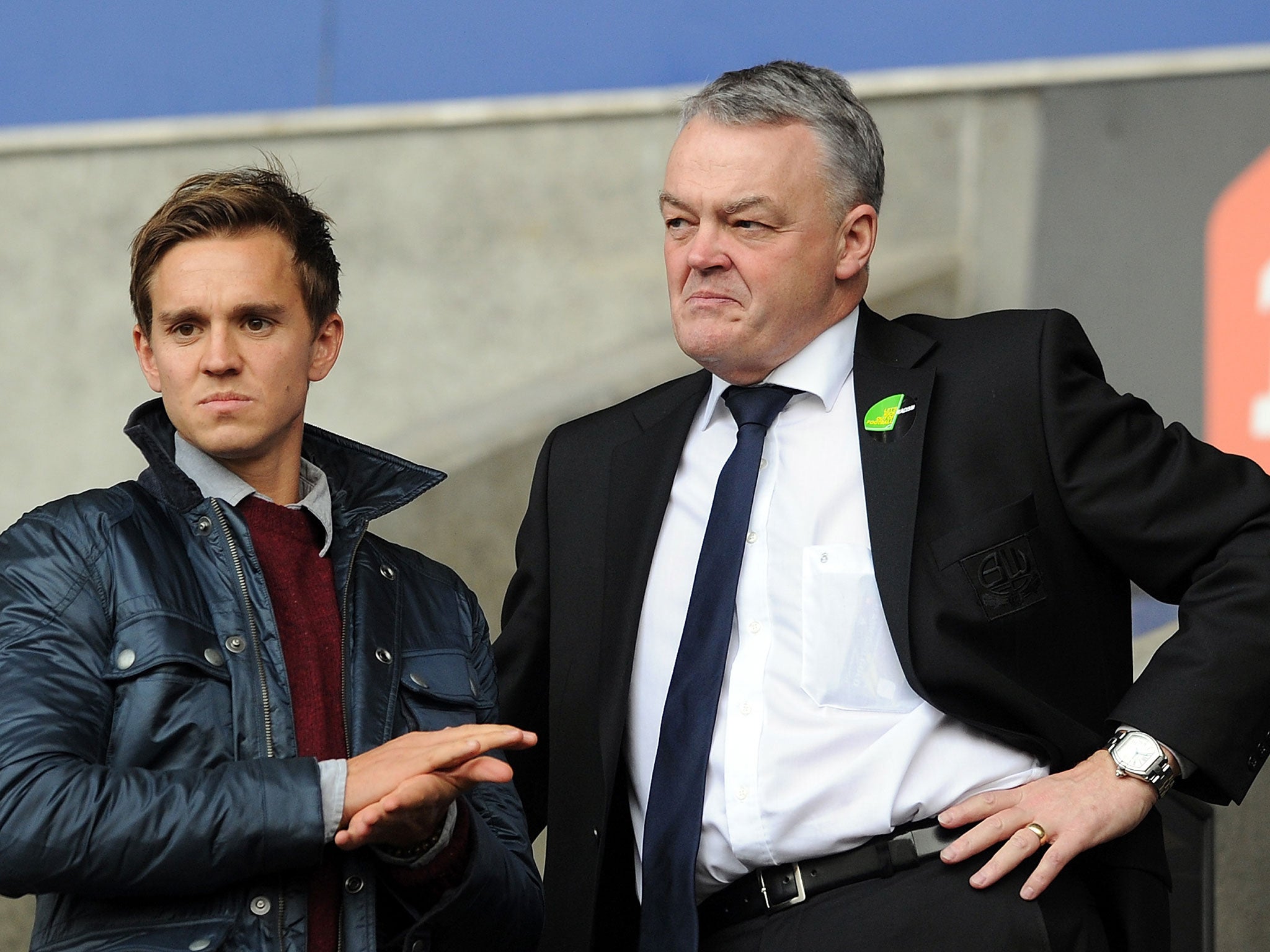 Bolton Wanderers chairman Phil Gartside (R) looks on during the npower Championship match between Bolton Wanderers and Bristol City