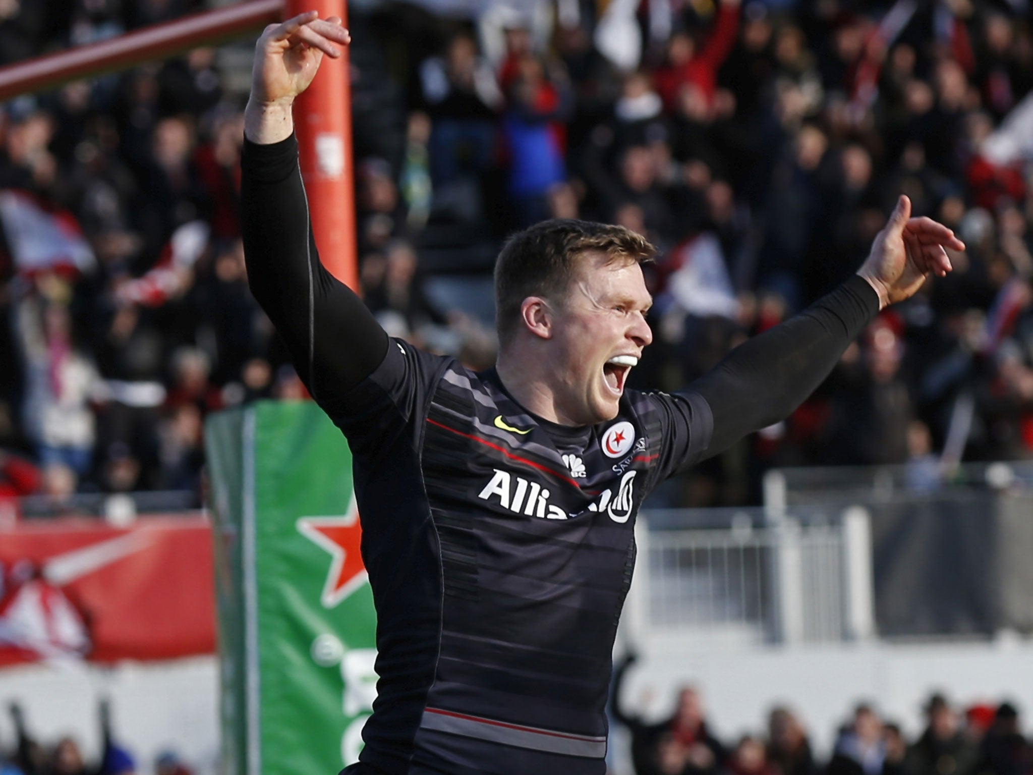 Chris Ashton celebrates a try against Munster