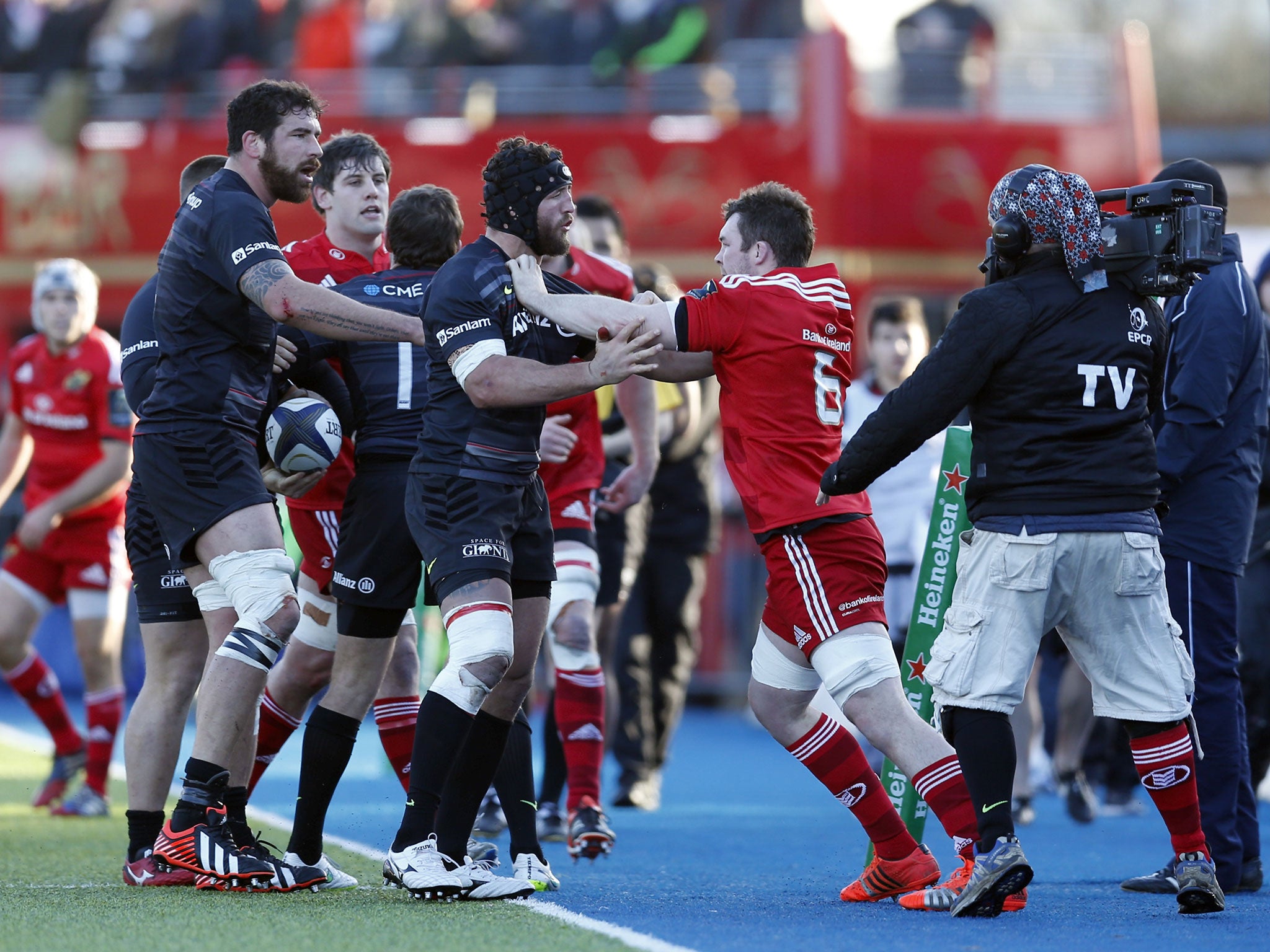 Jacques Burger and Peter O'Mahony clash during Saracens' win over Munster