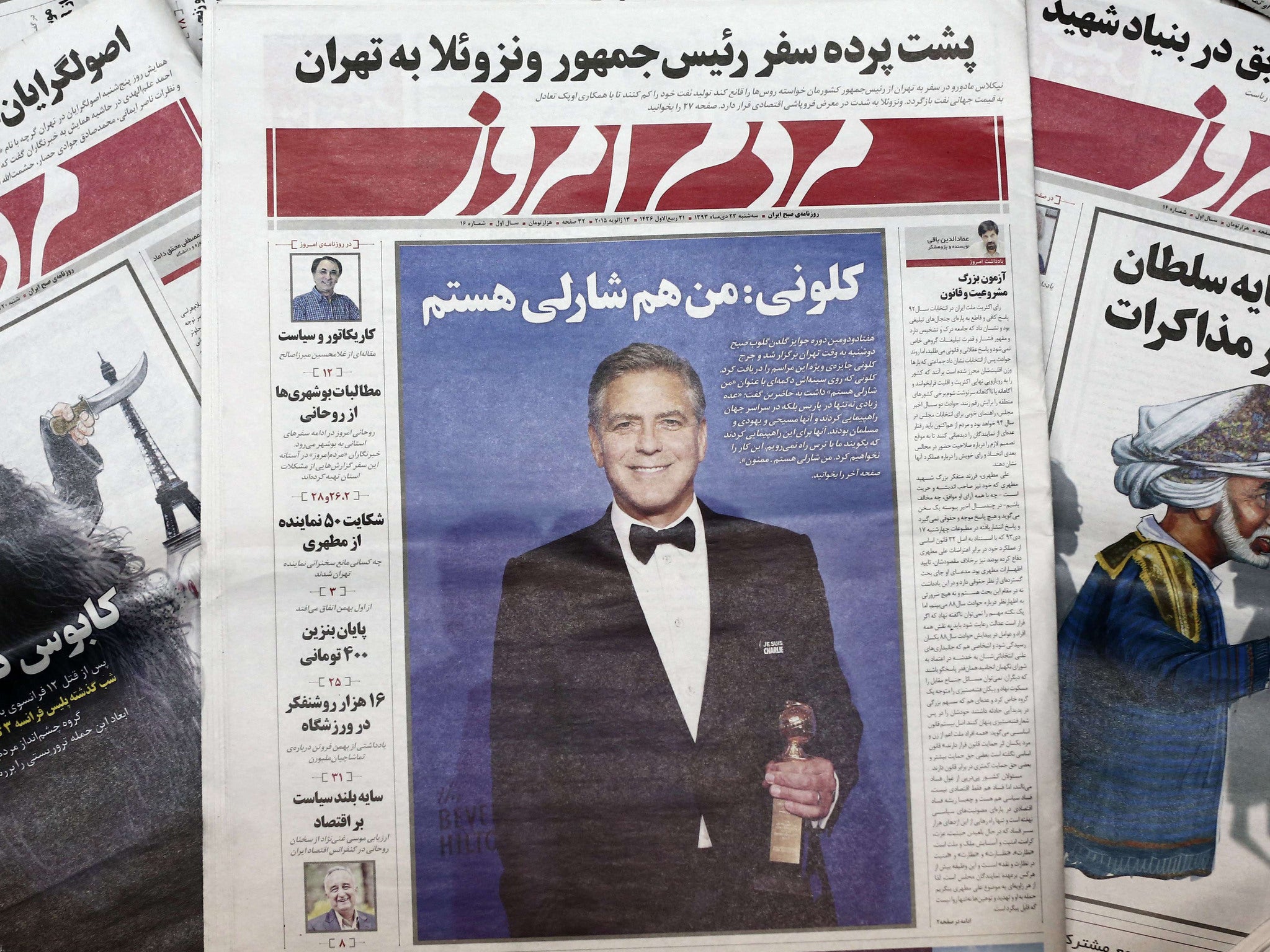 A picture taken in Tehran shows copies of the headline of Iranian reformist newspaper Mardom-e Emrouz (People of Today)