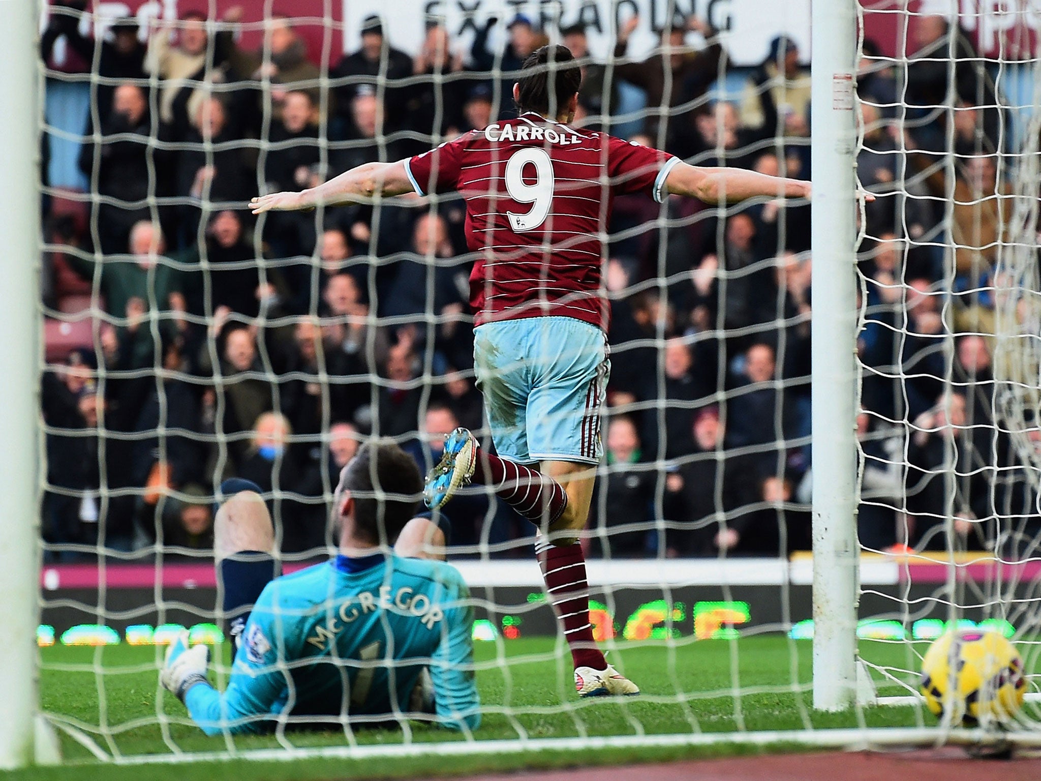 Andy Carroll celebrates opening the scoring
