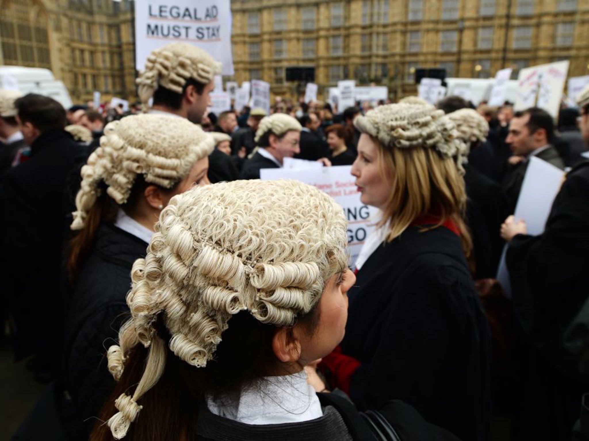 Lawyers march on Westminster in March 2014, to protest against cuts to legal aid (EPA)