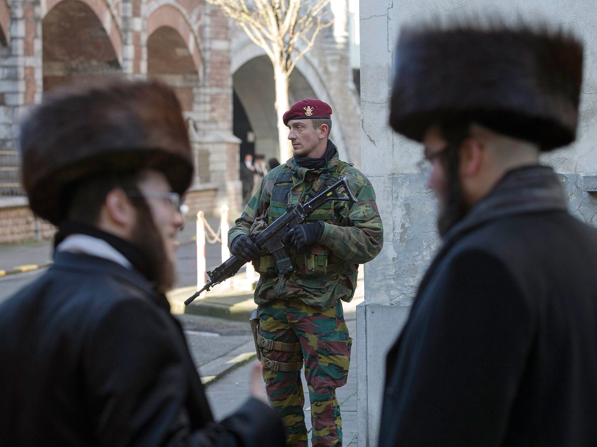 A Belgian paratrooper guards a Jewish school in Antwerp at the weekend, as security was tightened in major Belgium towns following the foiled terror plot in Verviers
