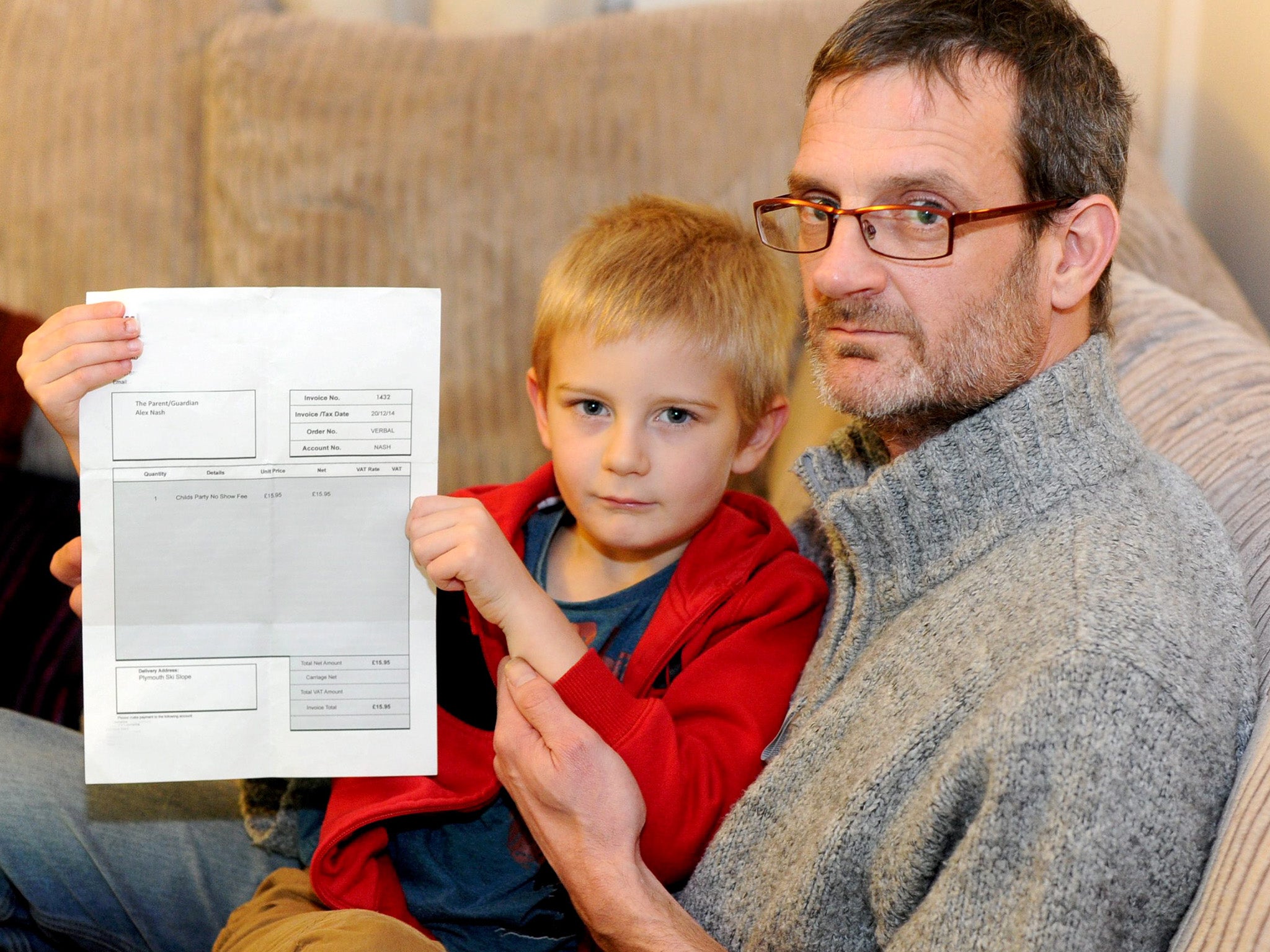 Derek Nash with his son Alex, 5, who has received an invoice and been threatened with a small claims court action after he didn't attend a children's birthday party.