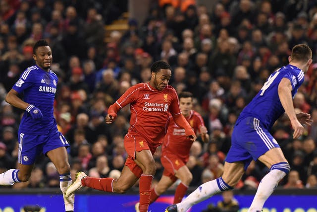 Raheem Sterling powers through the Chelsea defence