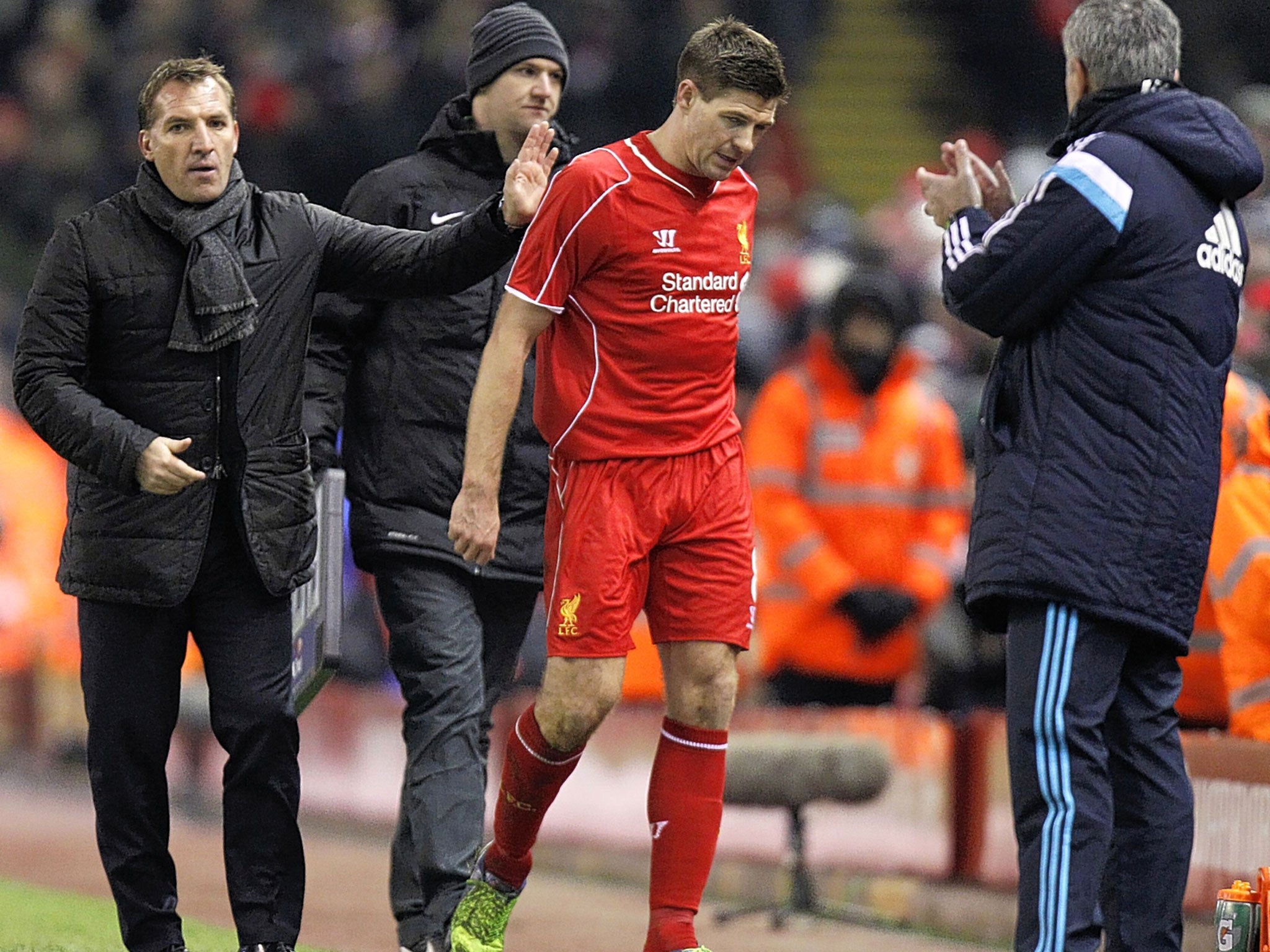 Steven Gerrard is taken off by Brendan Rodgers (right) when he could have threatened Chelsea further