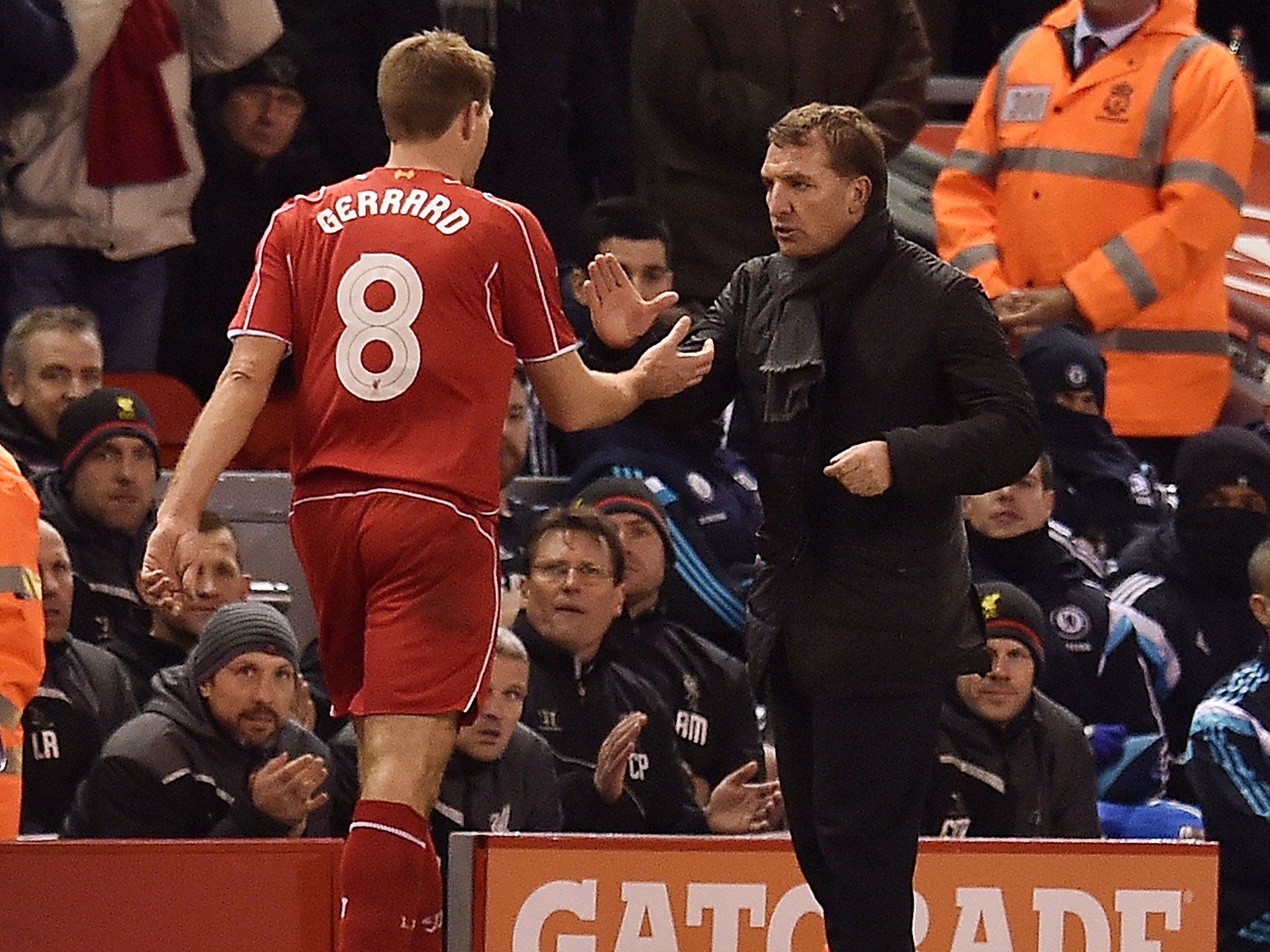 Brendan Rodgers meets Steven Gerrard as the midfielder is replaced