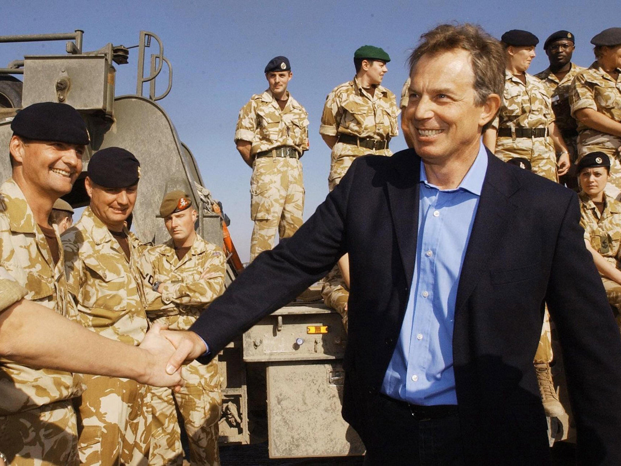 Tony Blair meets troops during a visit to Basra in 2004