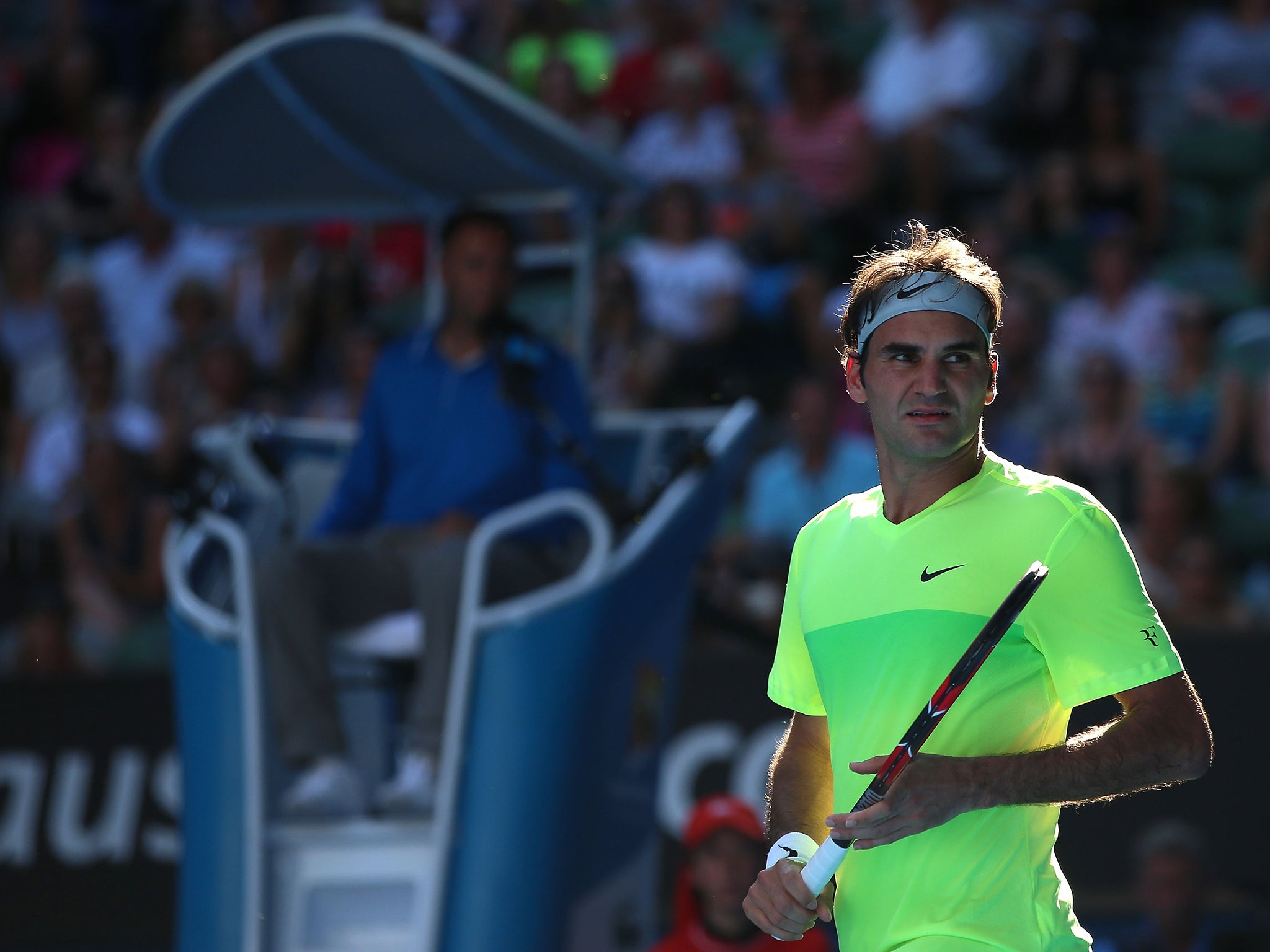 Roger Federer of Switzerland looks on in his second round match against Simone Bolelli
