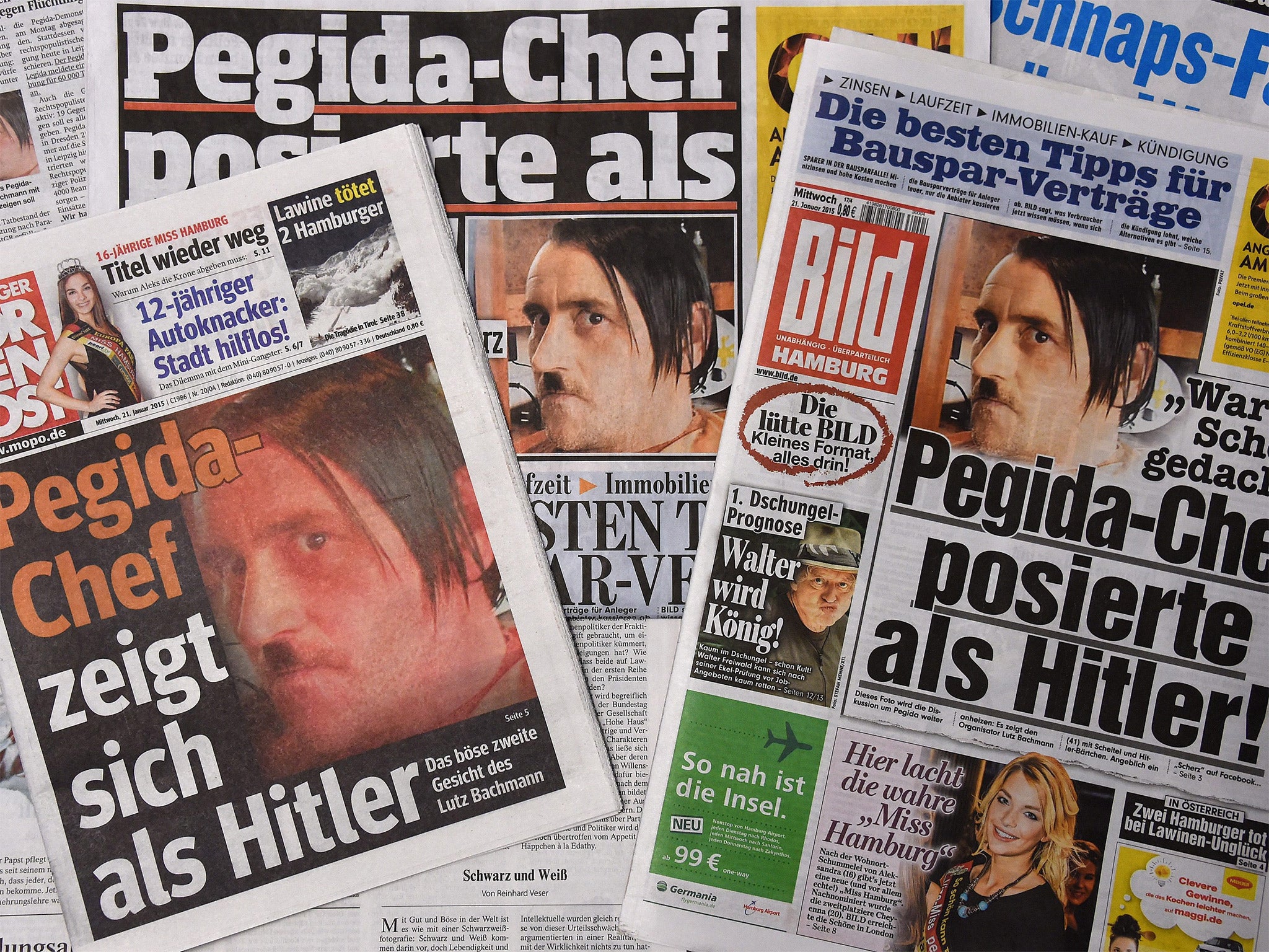 Front pages of German daily newspapers show the Pegida head, Lutz Bachmann, sporting a 'Hitler' moustache