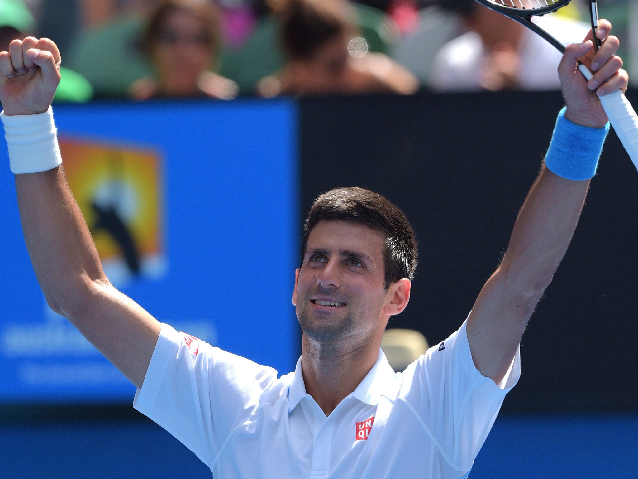 Novak Djokovic celebrates his straight-sets victory over Andrey Kuznetsov