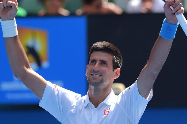Novak Djokovic celebrates his straight-sets victory over Andrey Kuznetsov