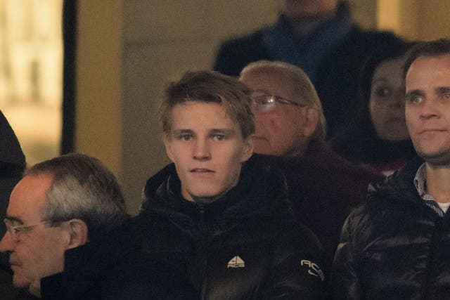 Martin Odegaard watches on during Atletico Madrid v Real Madrid