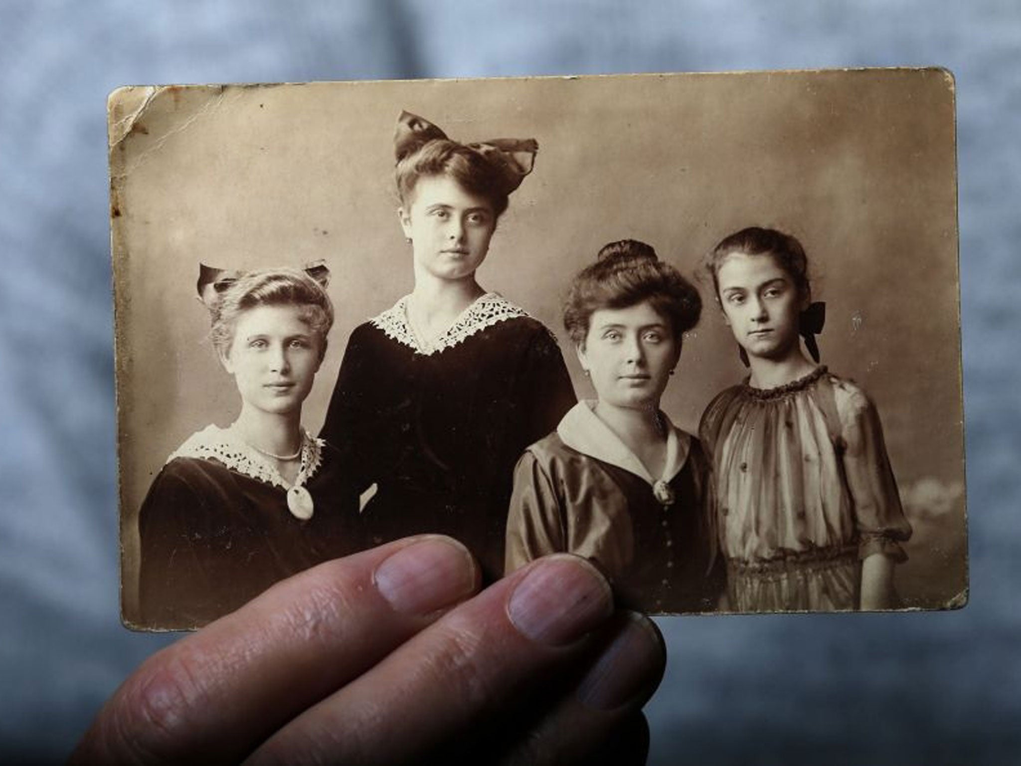 Bernath holds up a picture of his family, who were all killed in the concentration camp during World War Two.