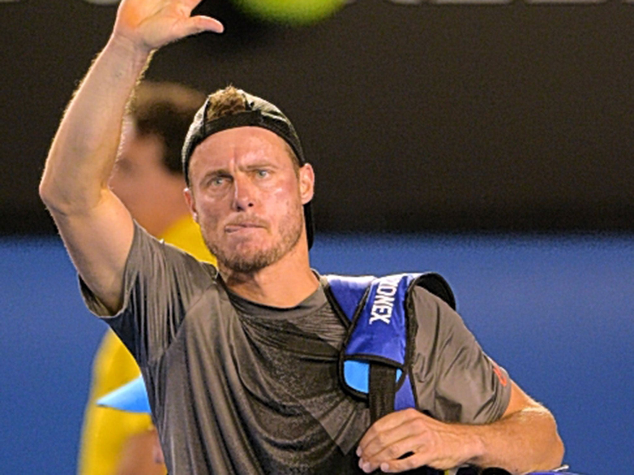 Lleyton Hewitt (left) charged into a two-set lead but still lost against Benjamin Becker