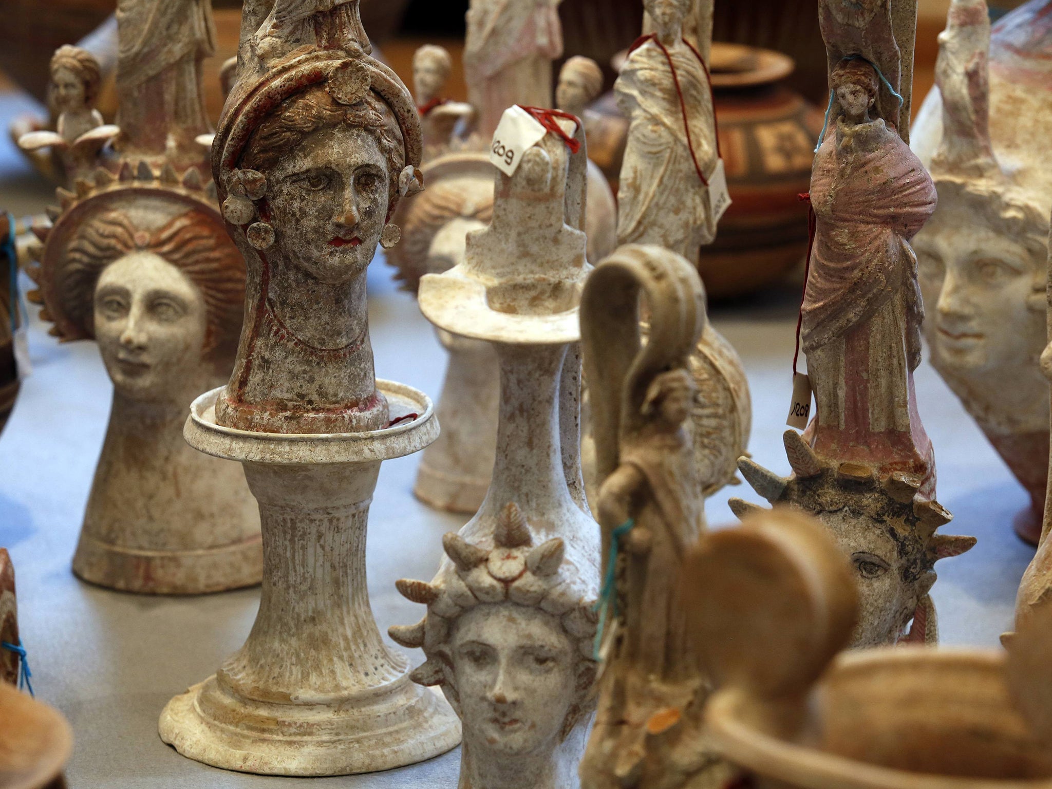 Some of the 5,361 ancient objects – which had been stolen by Italian and Swiss criminals –
in Rome this week