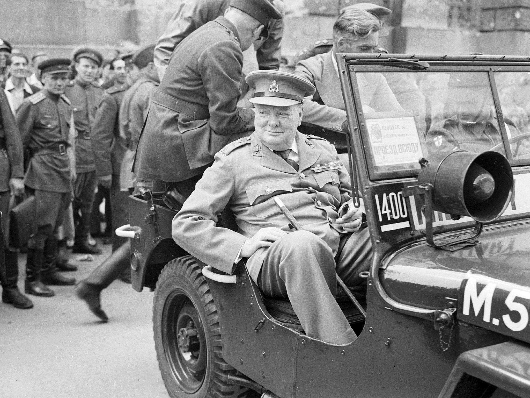 Winston Churchill outside the German Reichstag during a tour of the ruined city of Berlin on 16 July 1945