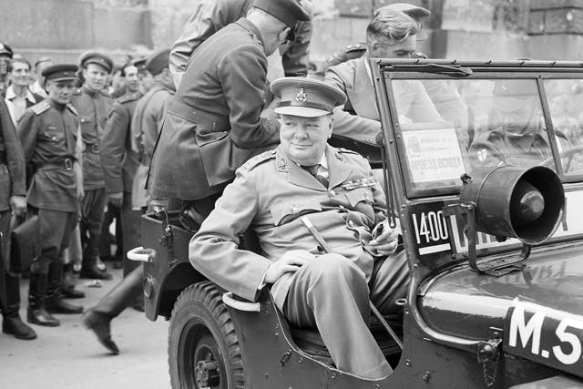 Winston Churchill outside the German Reichstag during a tour of the ruined city of Berlin on 16 July 1945