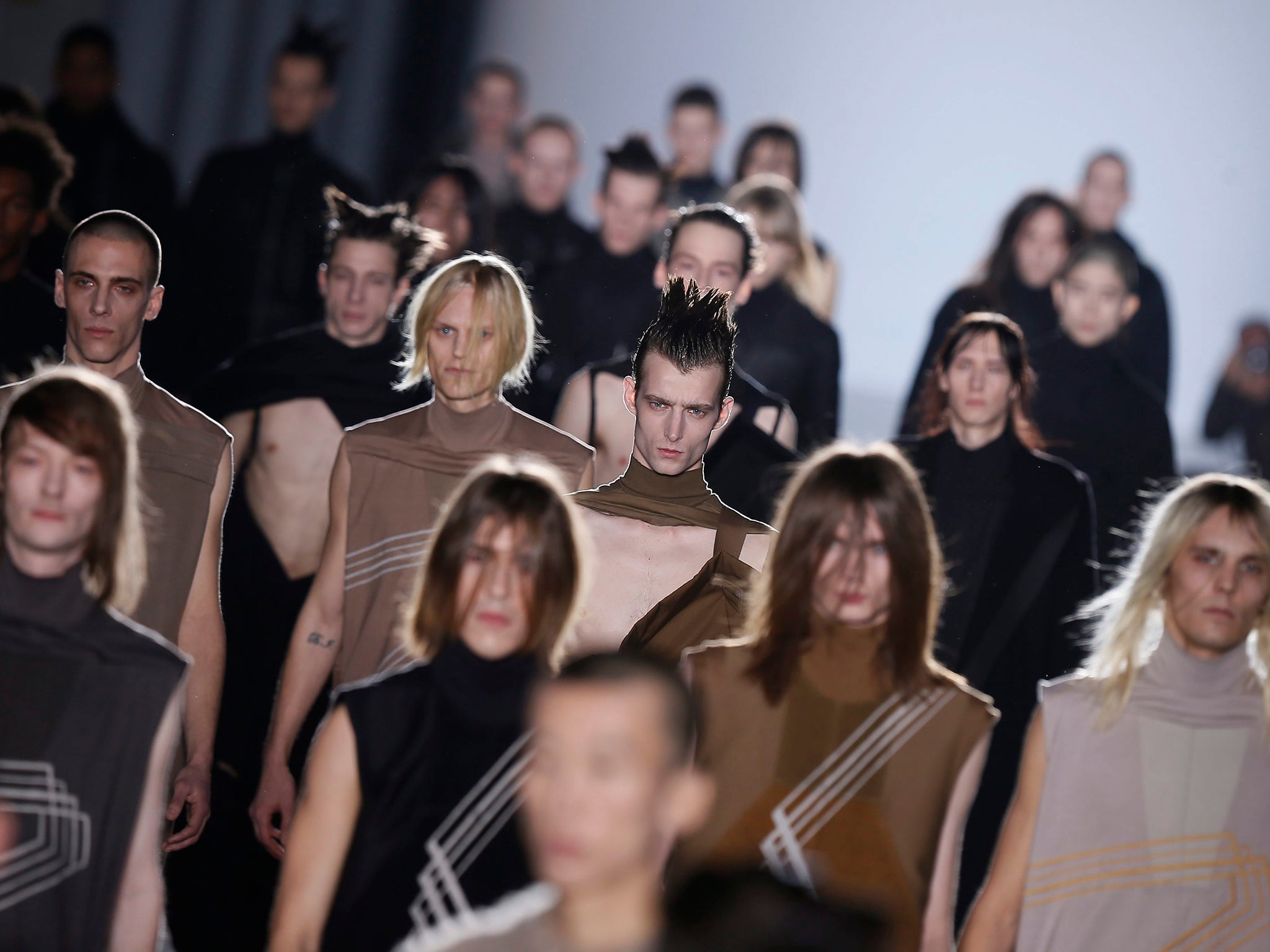 Models present creations from the Fall/Winter 2015/16 Men's collection by US designer Rick Owens during the Paris Fashion Week, in Paris, France