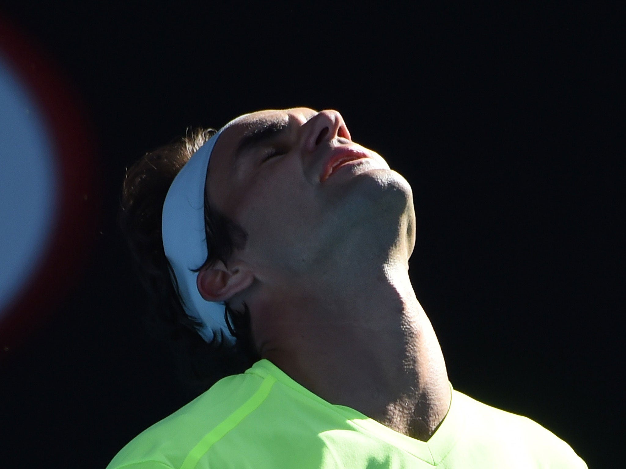 Roger Federer reacts to defeat against Andreas Seppi