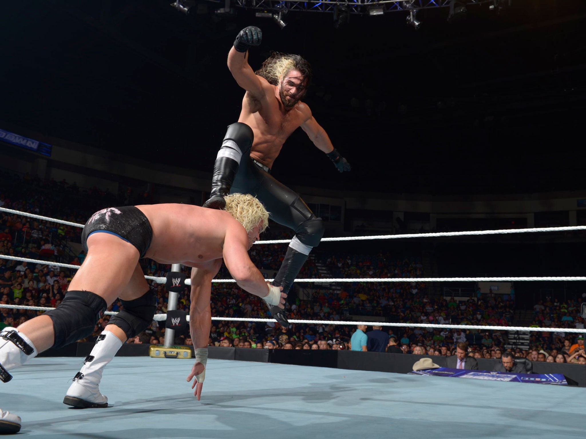 Rollins delivers his trademark finisher, a curb stomp, to Dolph Ziggler