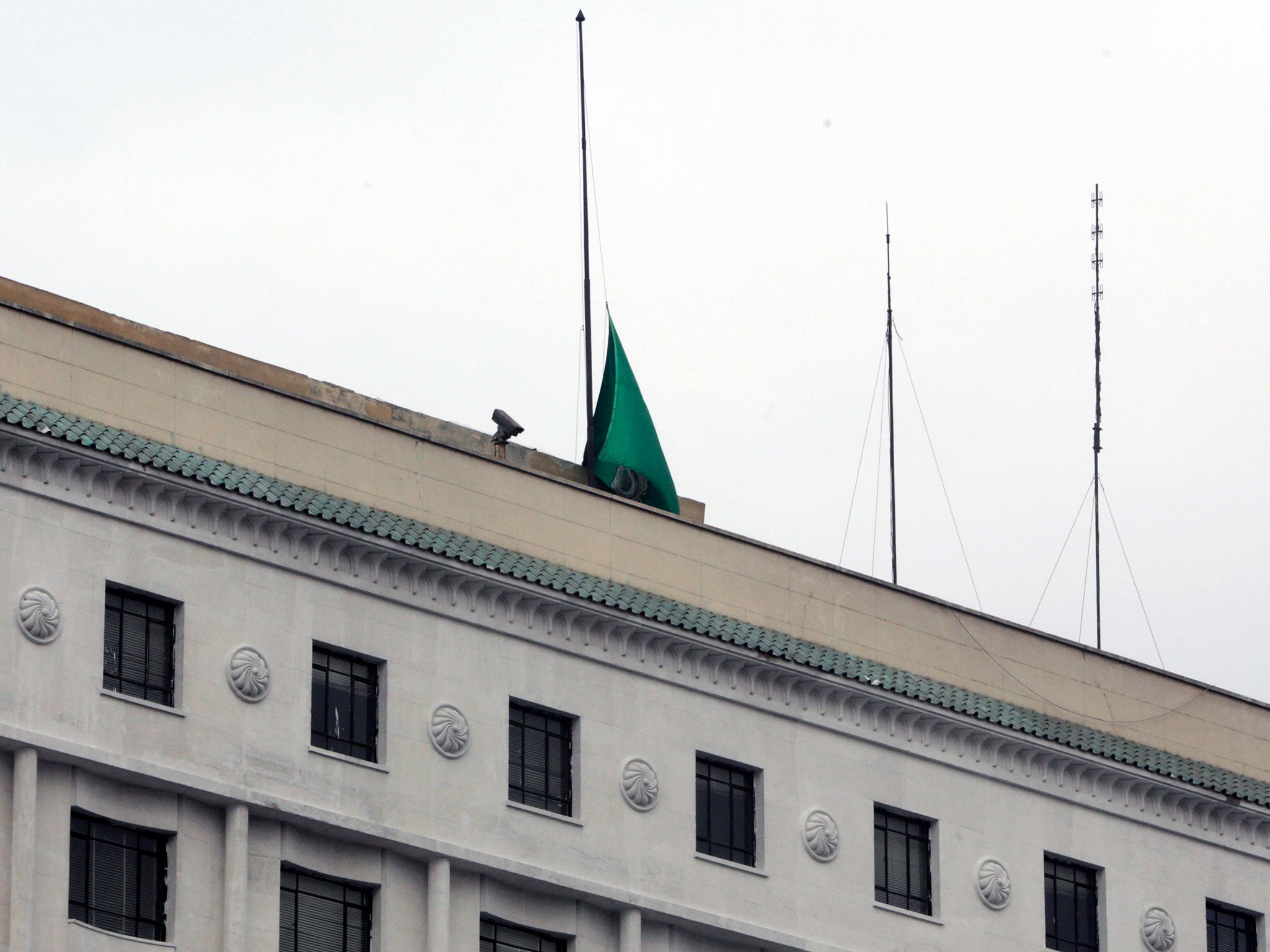 The Arab League flag stop the Arab League headquarters is seen down, marking the respect for the death of Saudi King Abdullah, in Cairo, Egypt